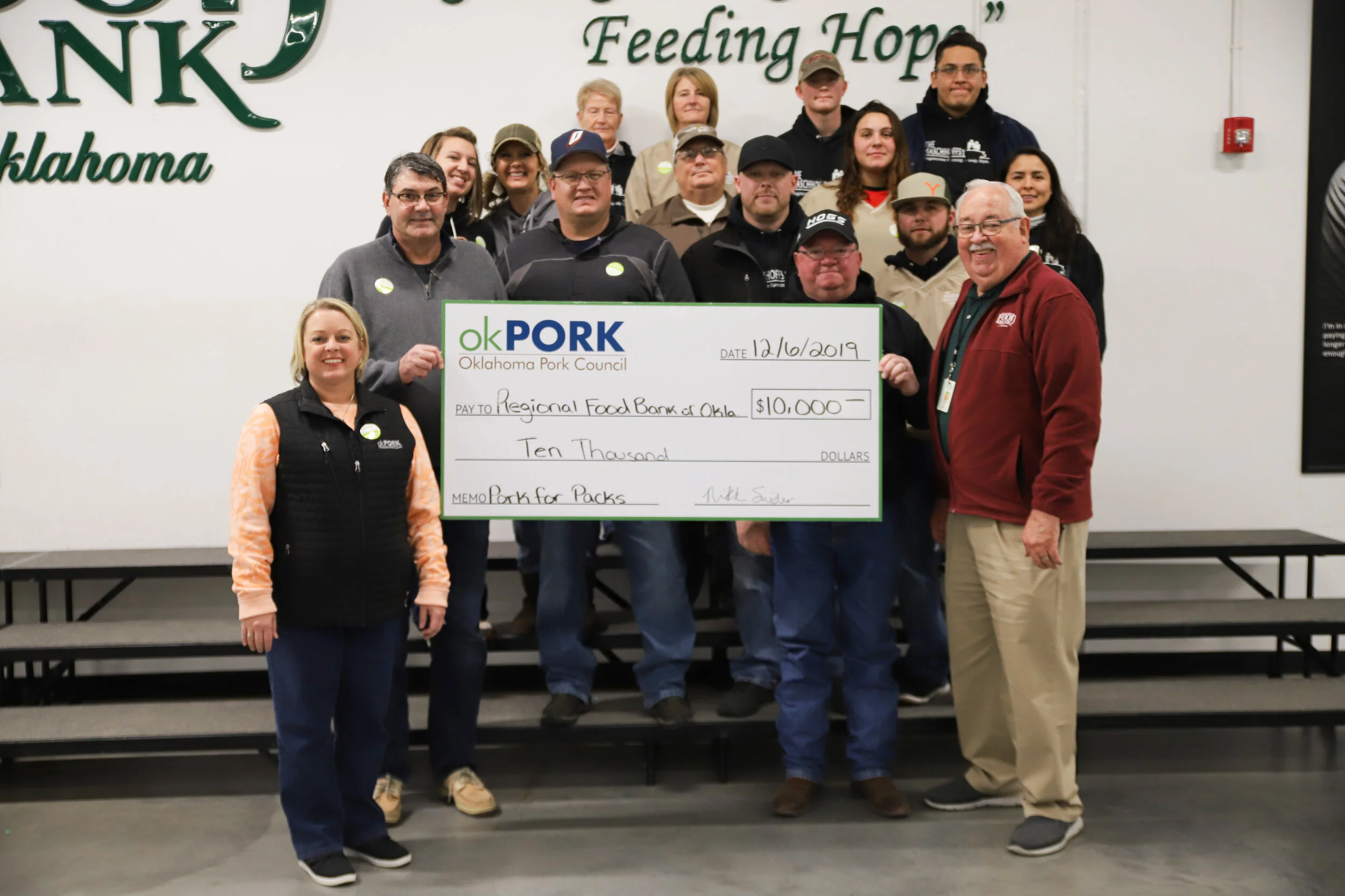 okPORK Gives Donation and Volunteers with the Regional Food Bank of Oklahoma