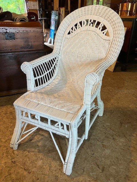  2231041 Wicker Lounge Chair made on Madeira Island, Spain. Has pull-out leg rest. Date of manufacture, 1914, incorporated into leg rest. $950 