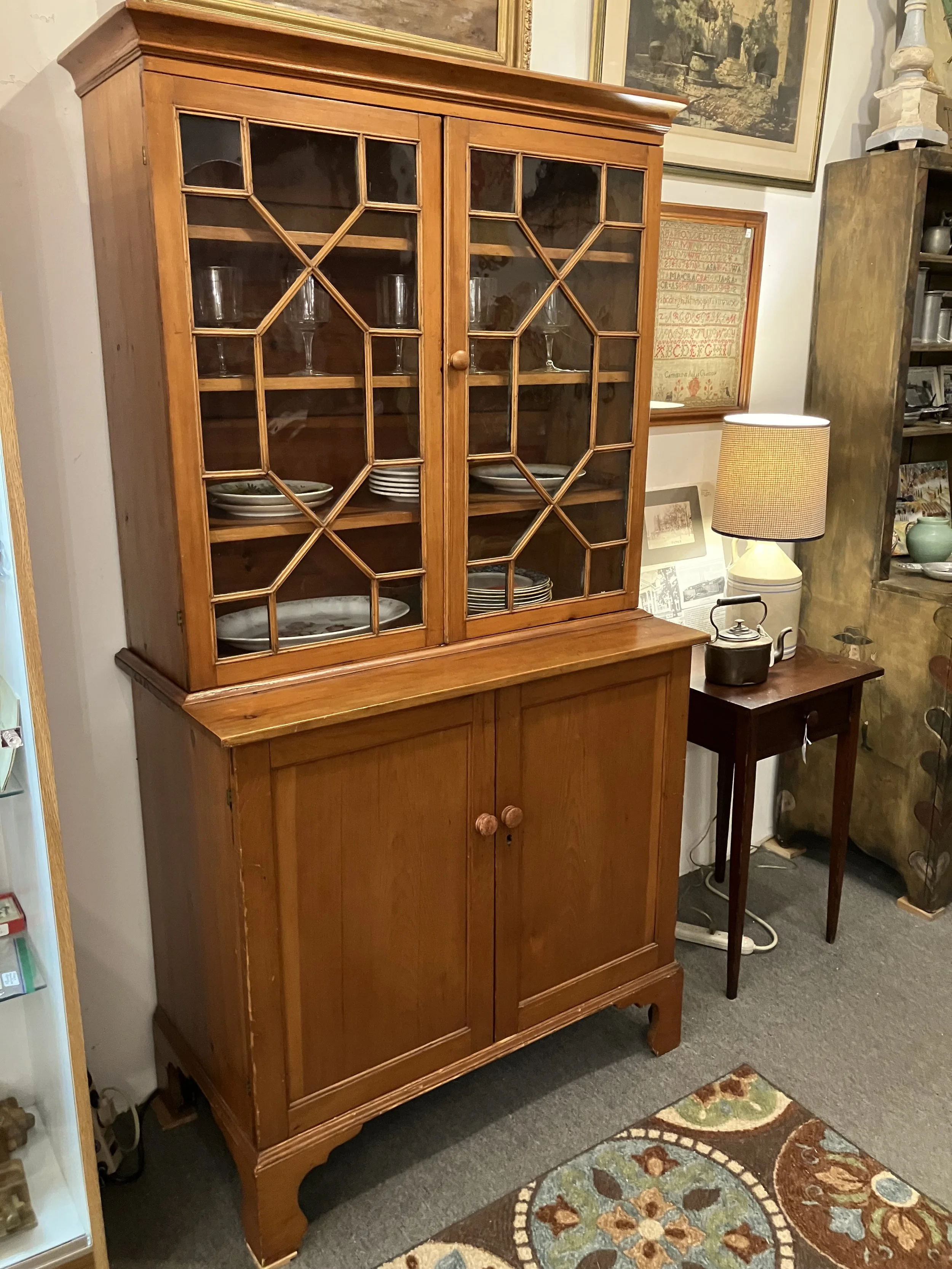 2251039 Country Pine, 2 Piece Step-back Cupboard or Hutch. Each door has 13 panes of original glass. Some old cracks. C. 1850. 39.25” W x 19.5” D x 74” H. $1375