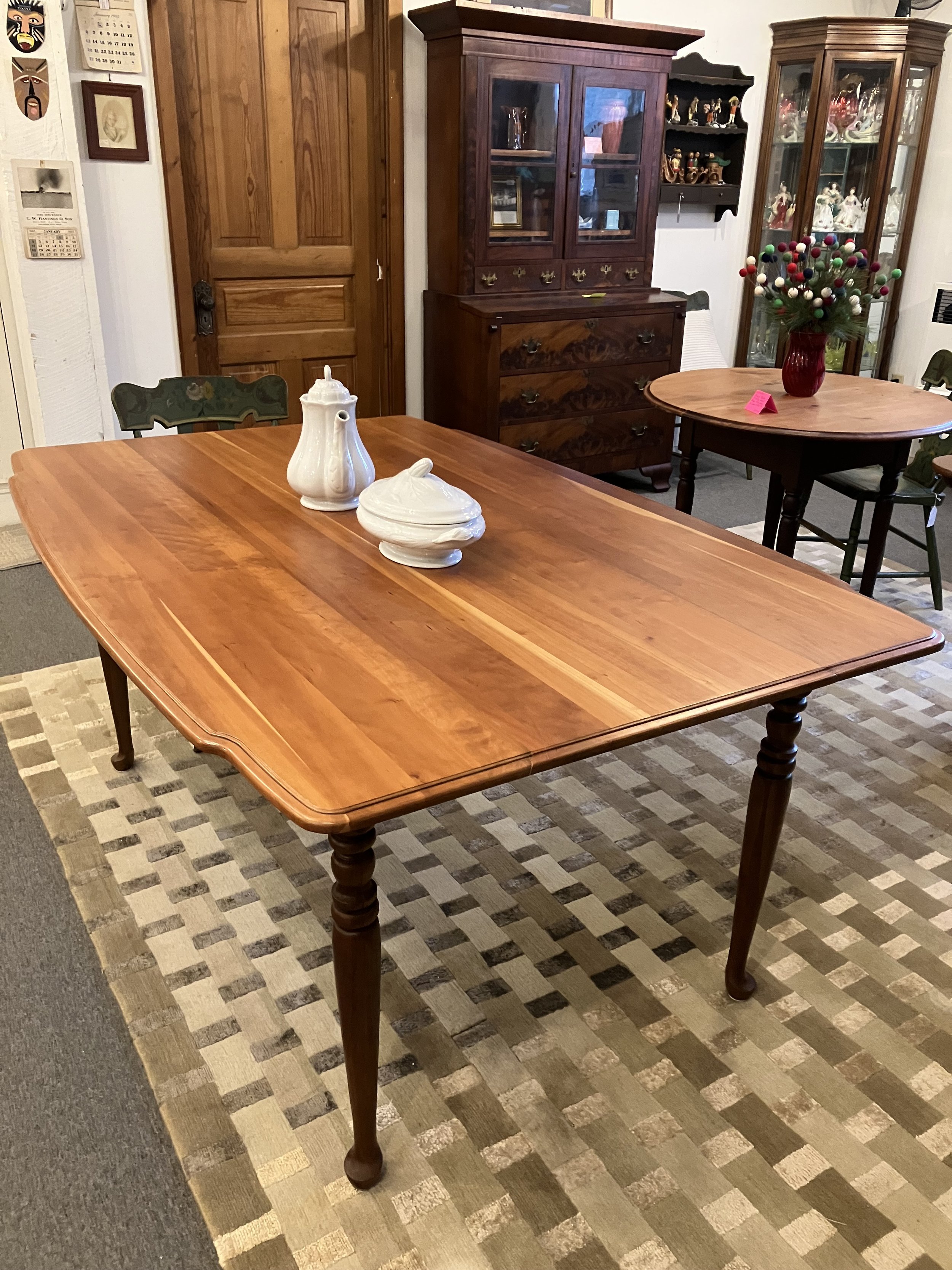  2261002 Solid Cherry Dining Table. Converted, old drop leaf table. Circa 1900. 66” L x 44.75” W x 29.75” H. Seats at least 6. $975 