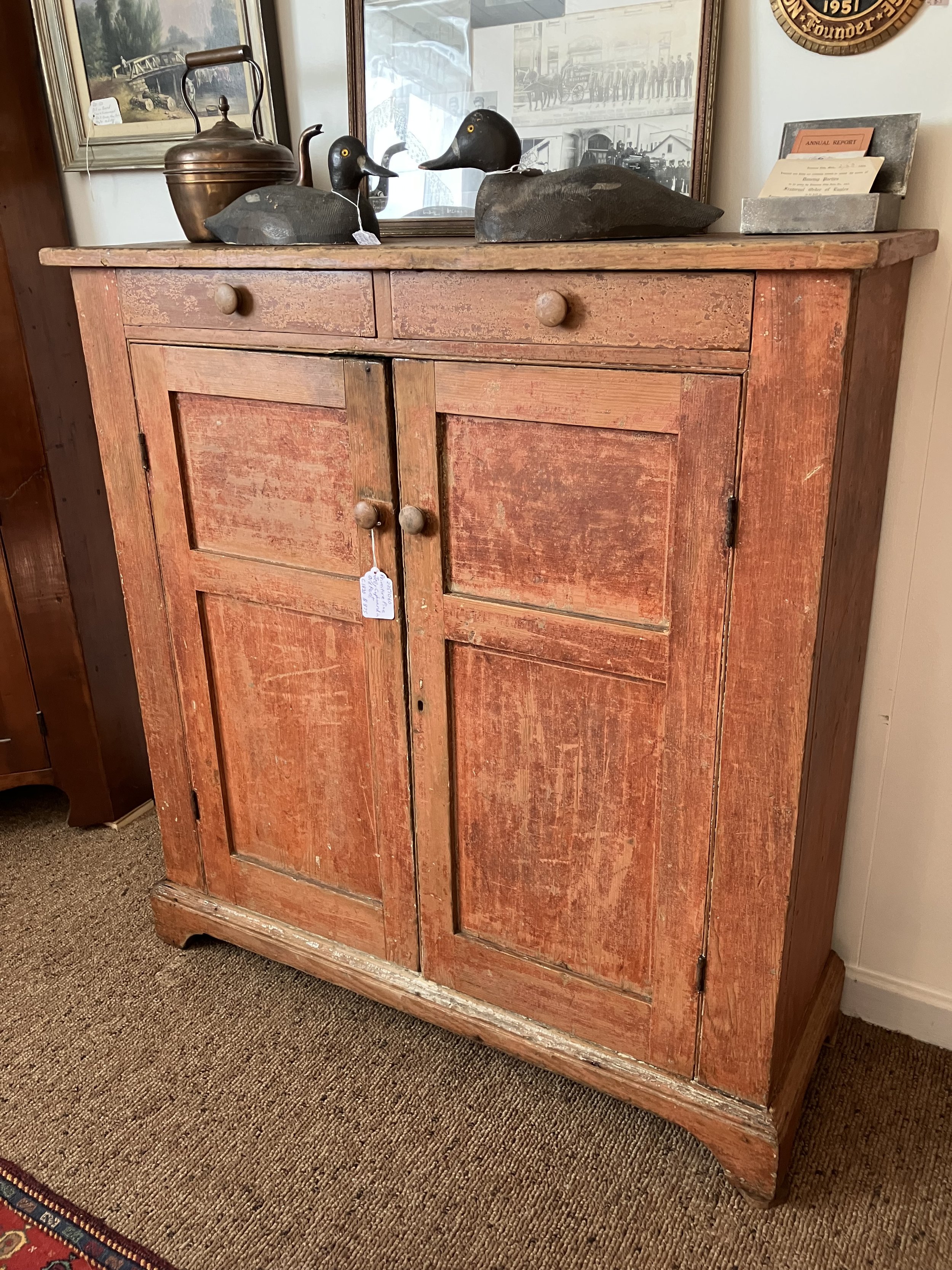  2251060 Primitive Pine Jelly Cupboard in Old Paint. 2 Drawers and 2 Doors. Circa 1830. 44” W x 15” D x 46.5” H. $875 