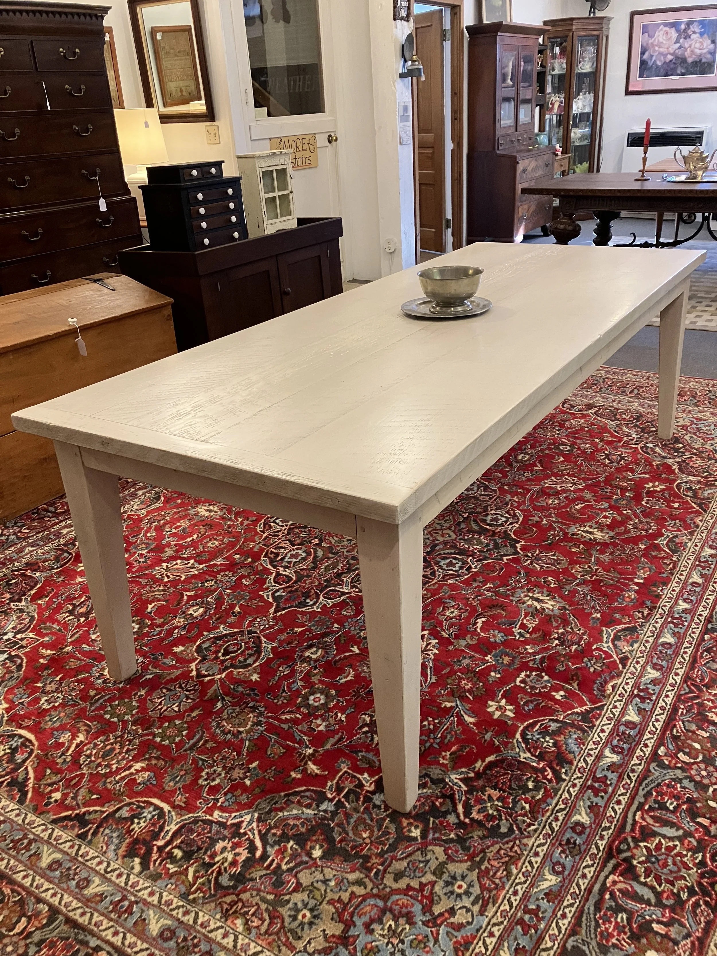  2261010 Country Pine Table in Driftwood Color Finish. Made by Glen Lundin. Four board top from old U.P. white pine lumber. 8’L x 39” W x 30” H. Seats 8-10. $2350 