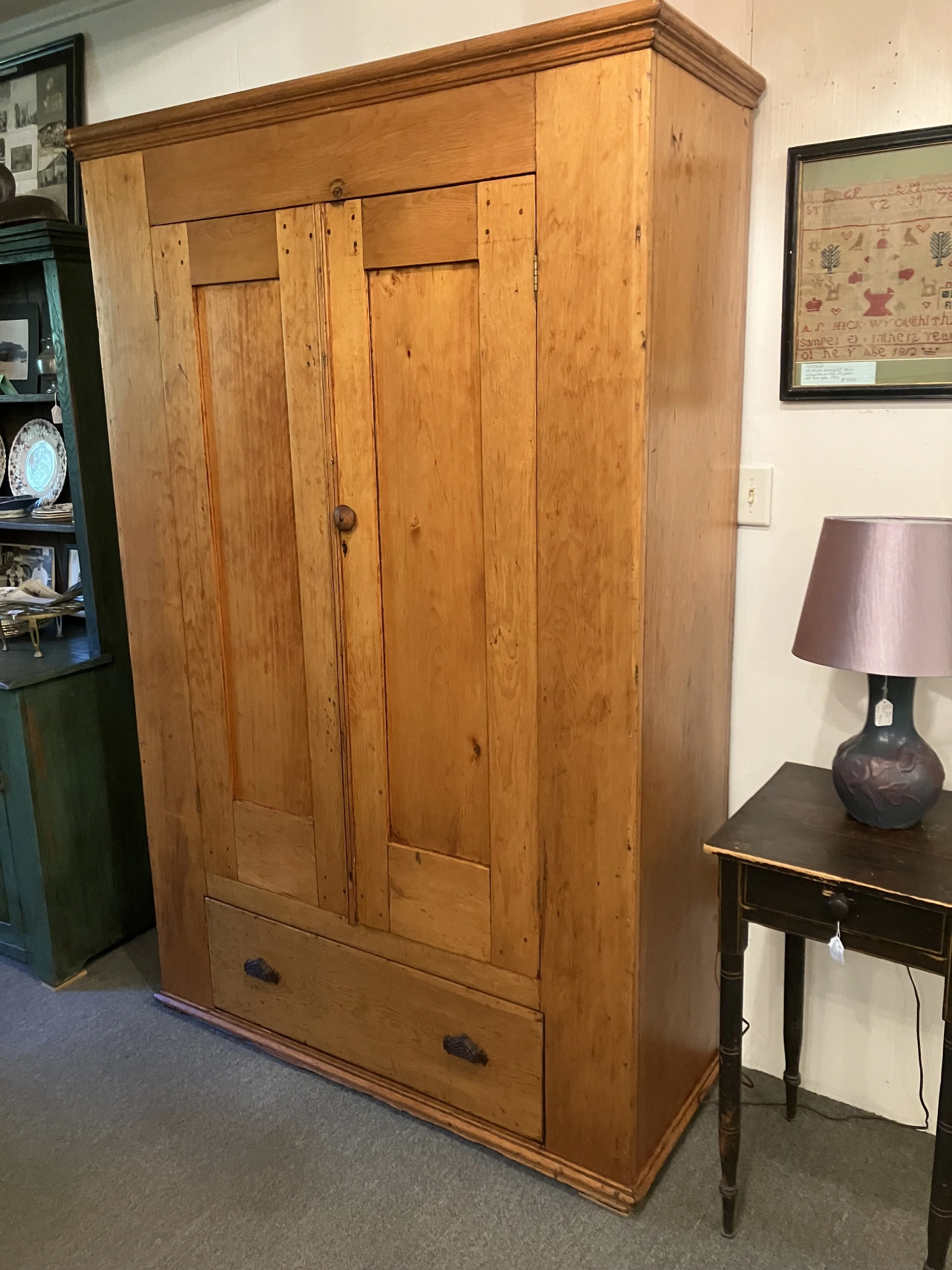  2261017 Country Pine Wardrobe/Armoire. 2 Doors over 1 Drawer. Circa 1865. 50” W x 19” D x 76.5” H. Inside has pole for hangers, but I can install shelves if desired. $1400.  