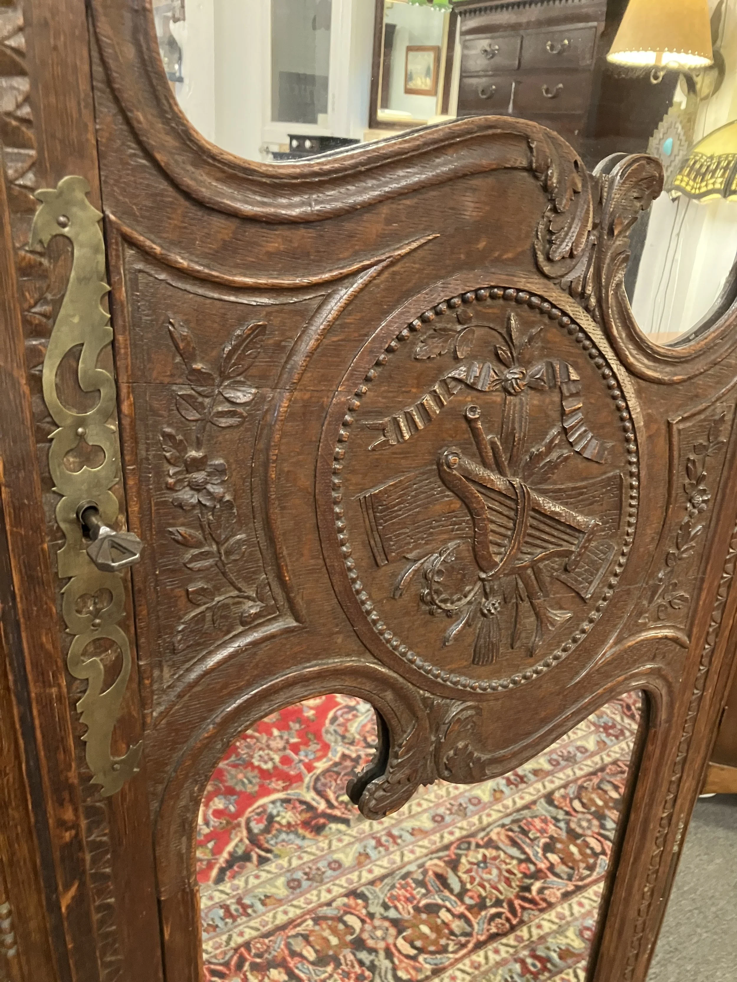  BH-1  Period, Louis XV Armoire originally made in Normandy, France. Made for the groom of a wedding. Hand carved. Mirrored doors. Circa 1750. 56.5” W x 21.5” D x 91.5” H.  