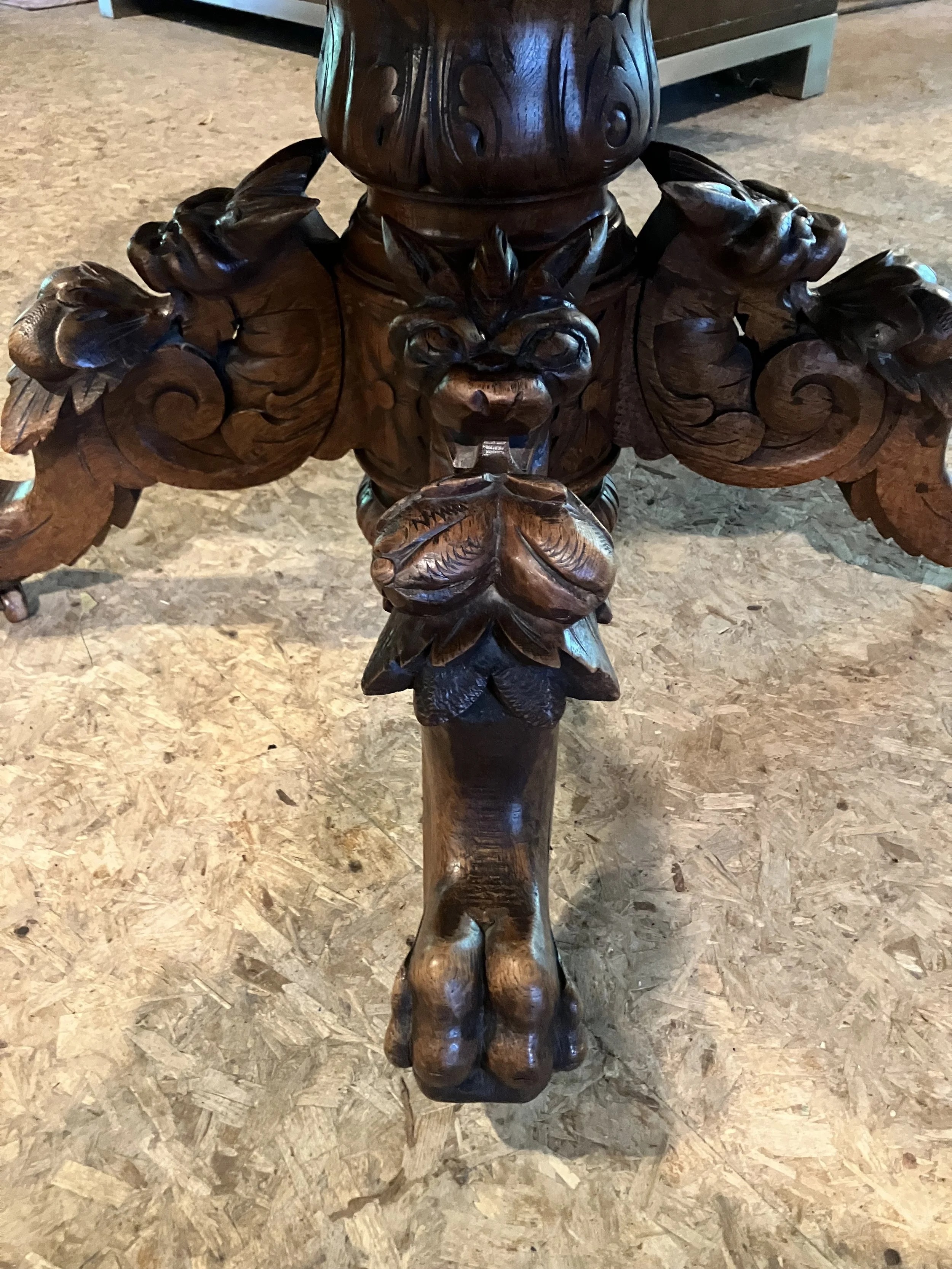  2261033 German, Oak, Table. Center pedestal has hand-carved winged griffins on the legs. Seats 4. Circa 1880. 45” diameter x 28” H. $950 