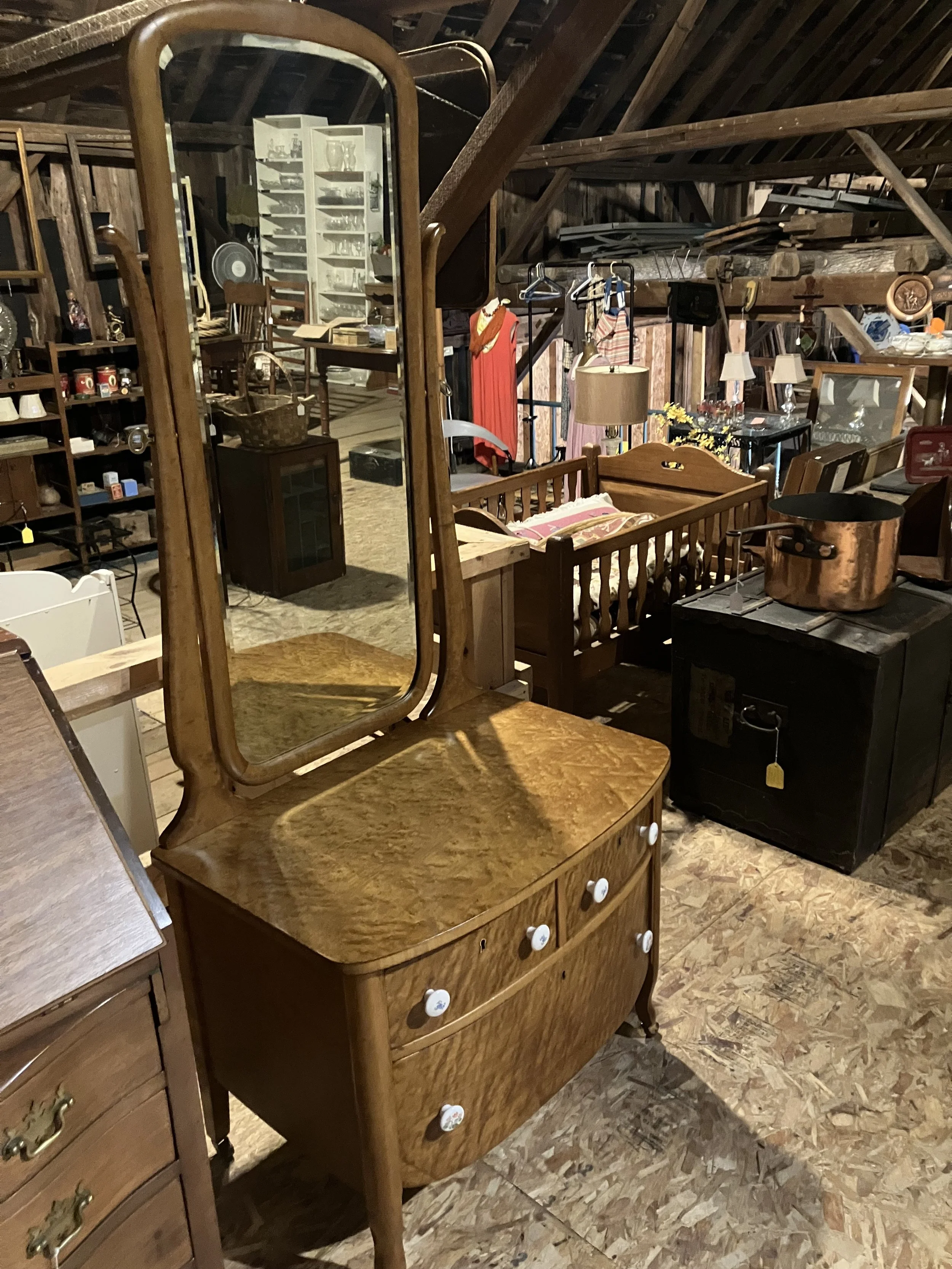  2261041 Dresser with 3 drawers and tall, beveled, pivoting mirror. Birdseye Maple. circa 1920. 30” W x 20” D x 69” H. $550 
