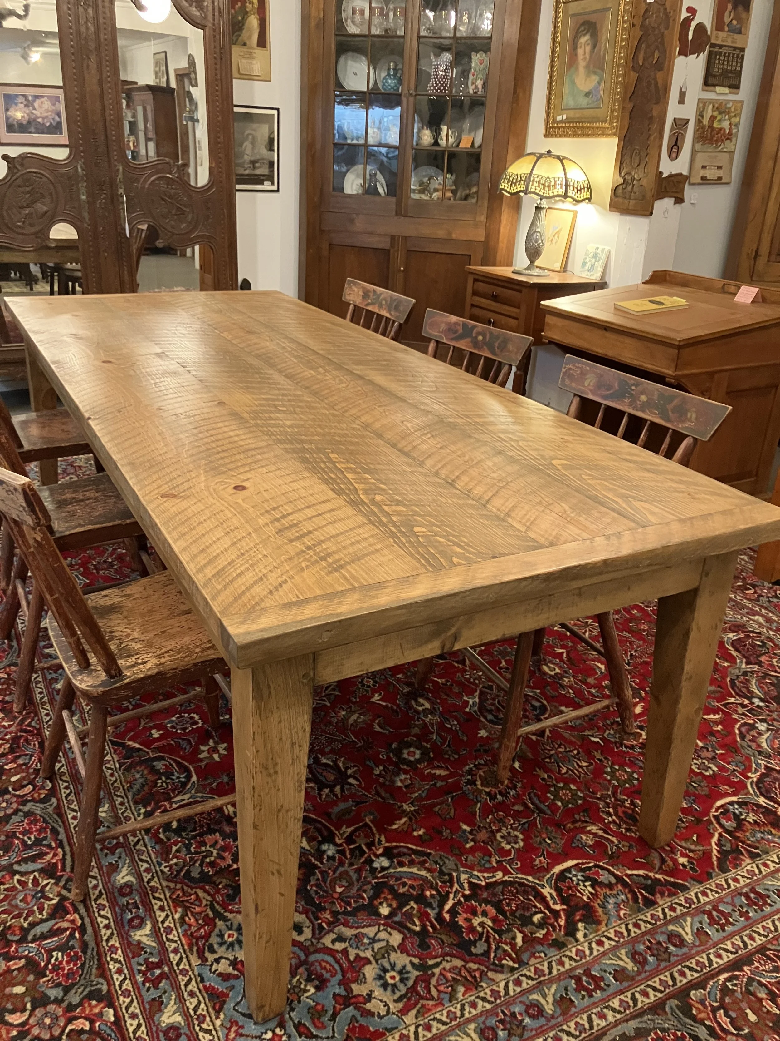  2261045 Country Dining Table. Made of white pine from Michigan’s Delta Cty by Glen Lundin. 8’ L x 39.25” W x 30.25” H. Seats 10 people. $2750 