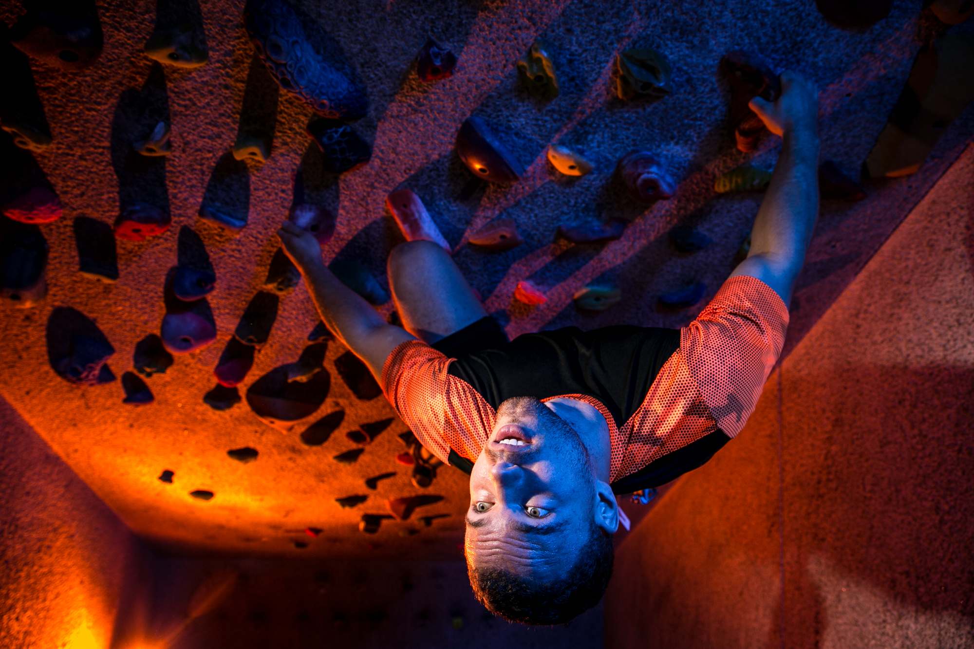  Gabe Irwin, an avid rock climber and student at the University of North Carolina at Chapel Hill,&nbsp;climbs in "the Cave" at UNC's climbing center on September 26, 2017. 