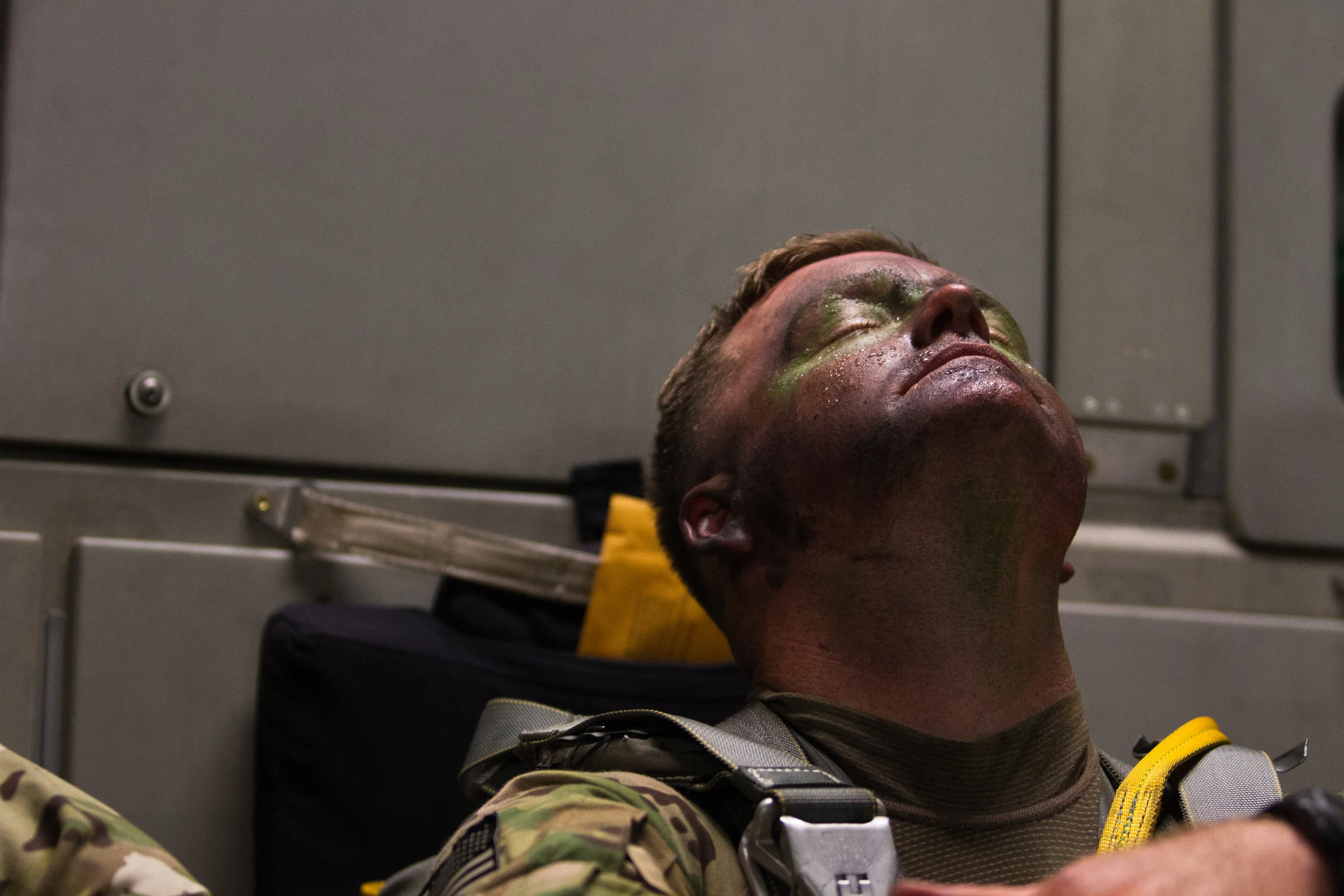 Staff Sergeant Wesley Hatfield waits for the transport plane he is on to be fixed during a training jump at Fort Bragg, N.C. on July 26, 2017.