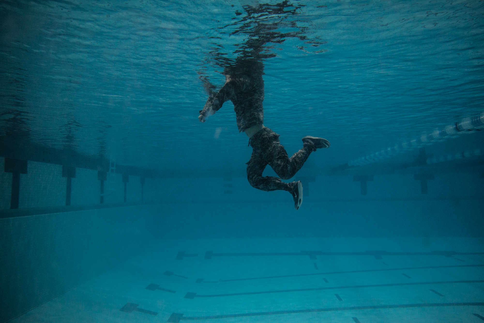  Another part of the combat swim test is showing the ability to swim while fully clothed, including shoes, for an extended period of time. The idea behind the swim test is to prepare cadets with the possibility of water-involved situations they may f