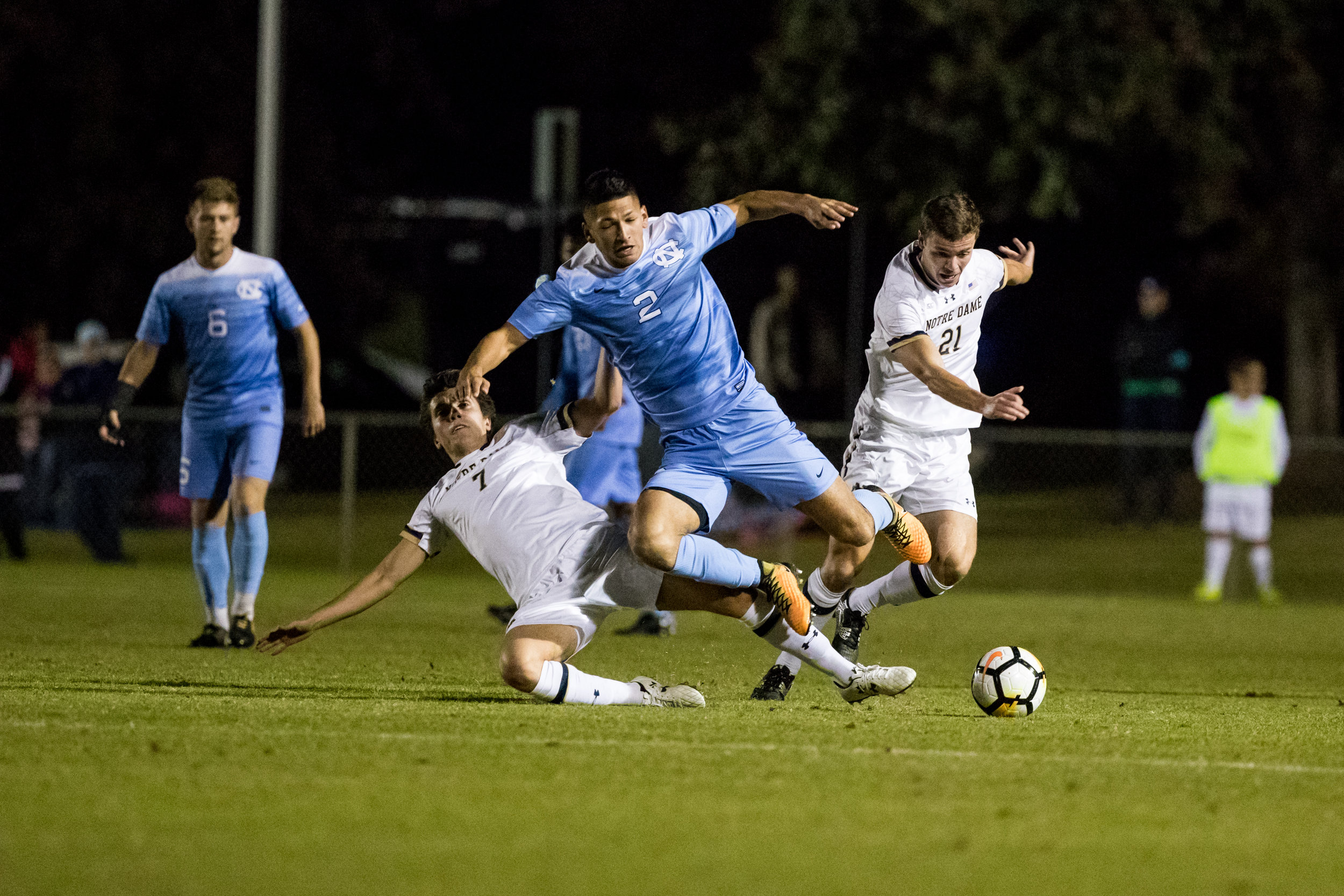  UNC's Maurici Pineda vaults a Notre Dame defender during a match on October 27, 2017. UNC would win the match 3 to 0. 