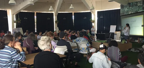 Explaining the Kokua 2020 plan to Co-op members.