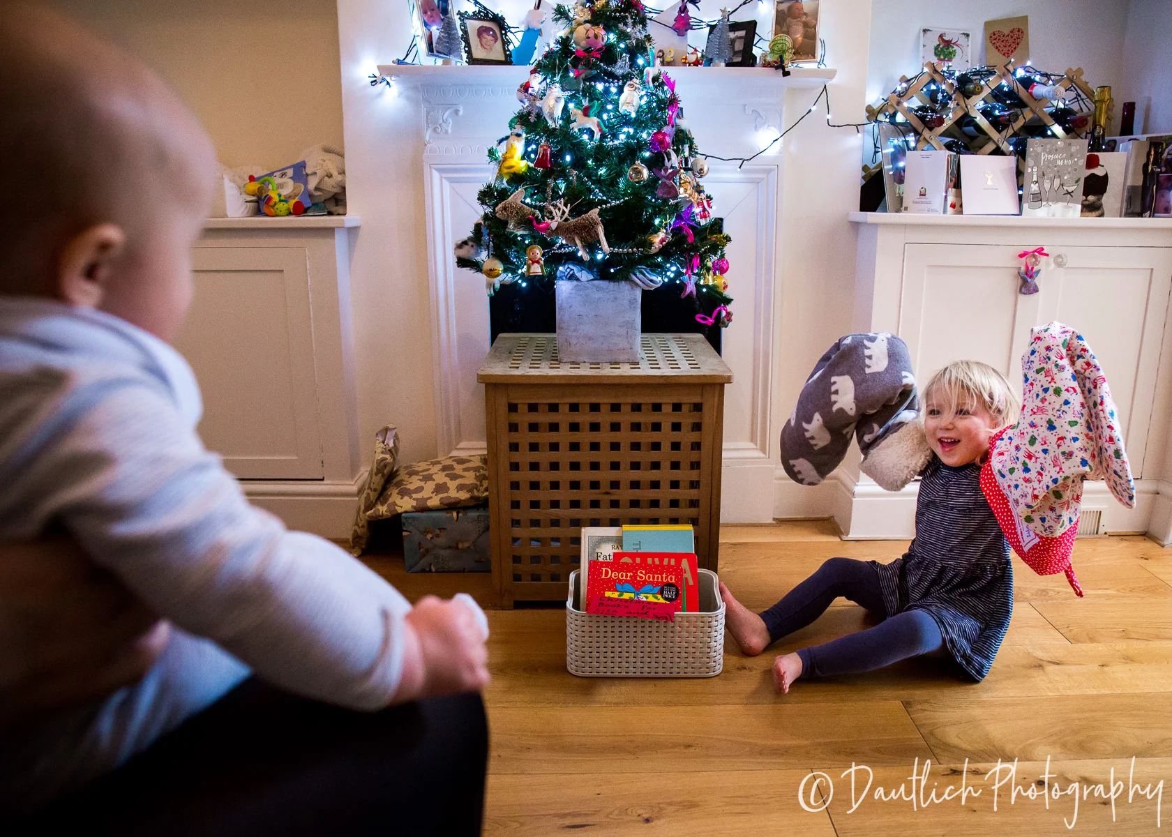 "Having these photos helps me to embed memories about this Christmas, when my children are nearly 3 and 6 months old. I’ll remember the excitement and the magic of this time by looking at these photos, especially the shots of Lila playing with her stockings, showing us her favourite decorations on the tree, and generally being an excited scamp!"
