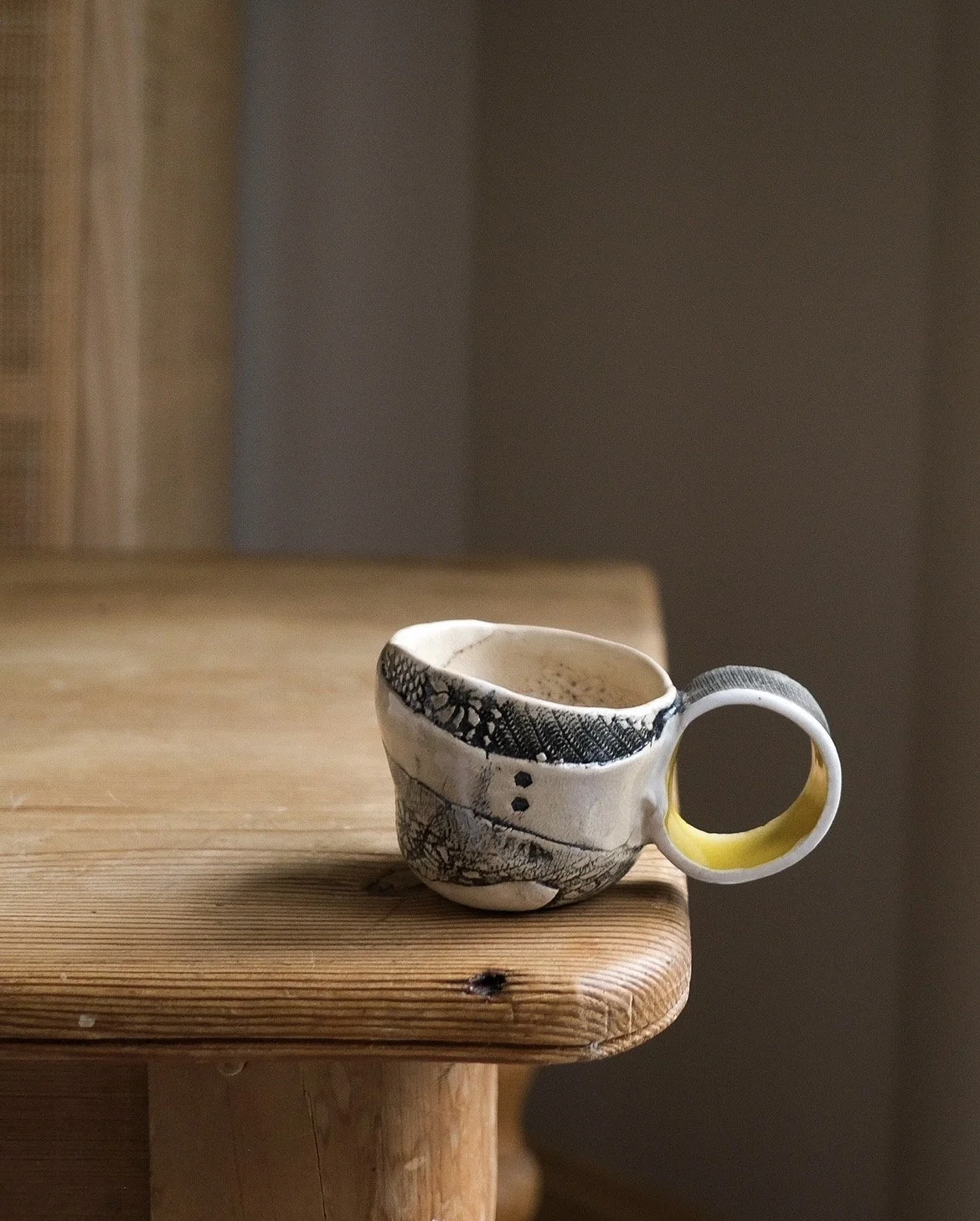 Ringleader Cup Built by hand with clay ribbons textured with vintage lace and embroidery