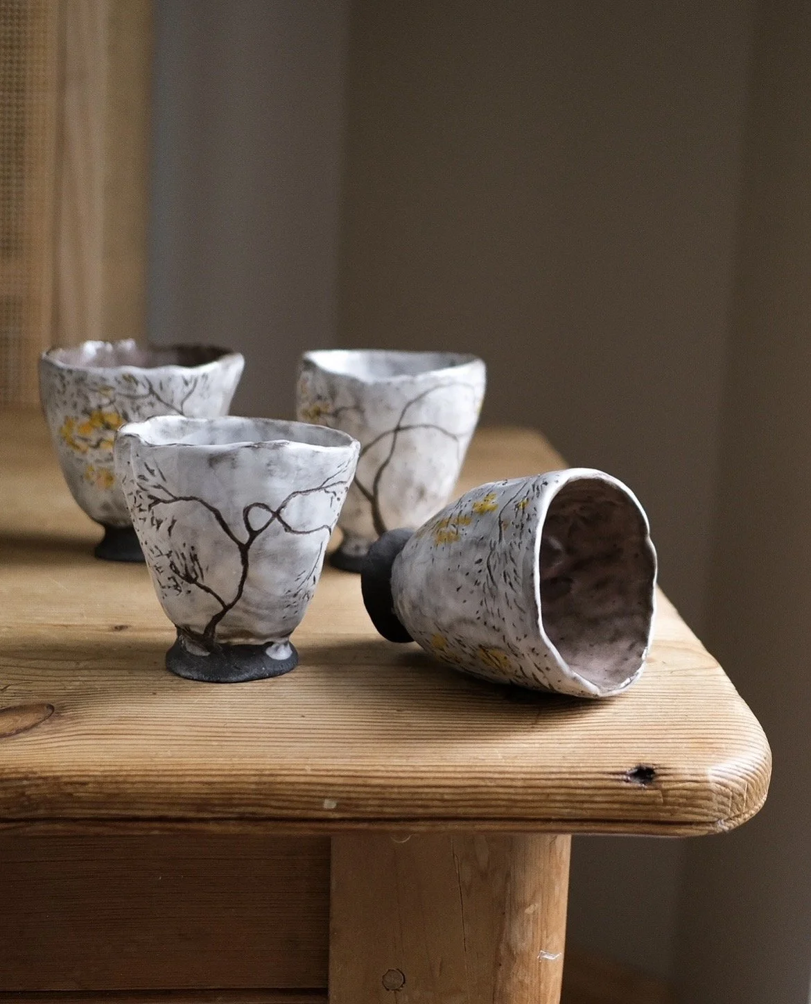 Willow Etch Cup, hand pinched in dark clay, etched tree designs by hand