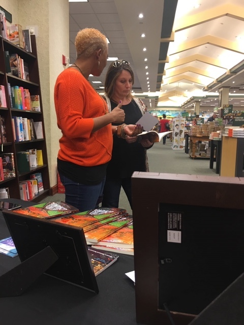 lolita talking with female customer book signing.JPG