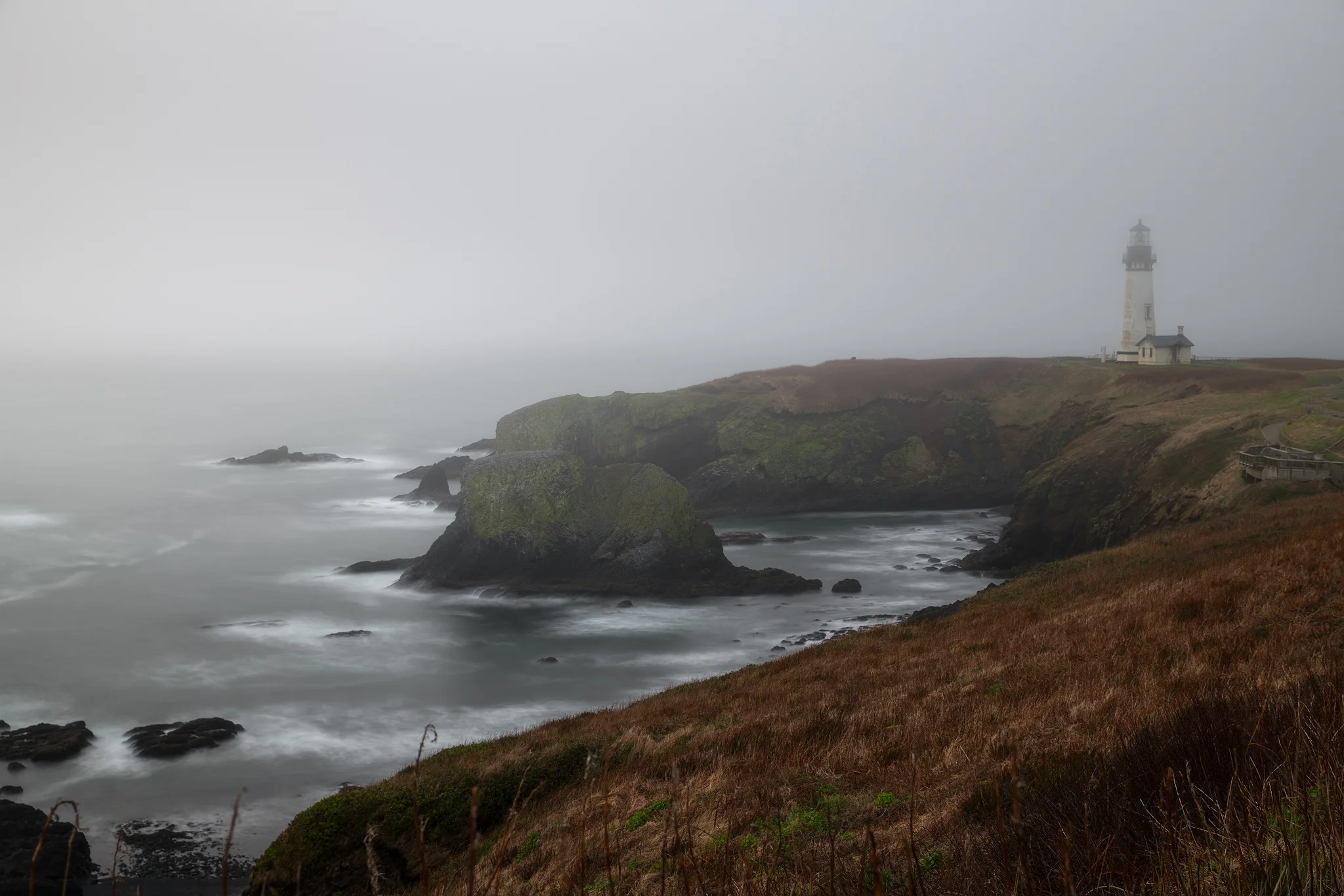 Yaquina Head Lighthouse during a foggy afternoon.