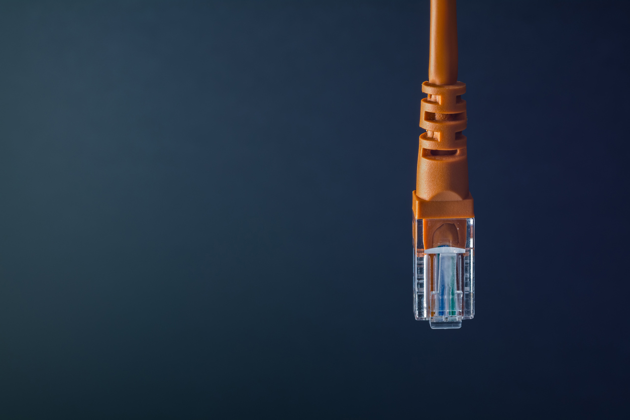 Home-Networking-RJ45-ethernet-data-cable-orange-pvc-sleeve-T568B-Grey-background