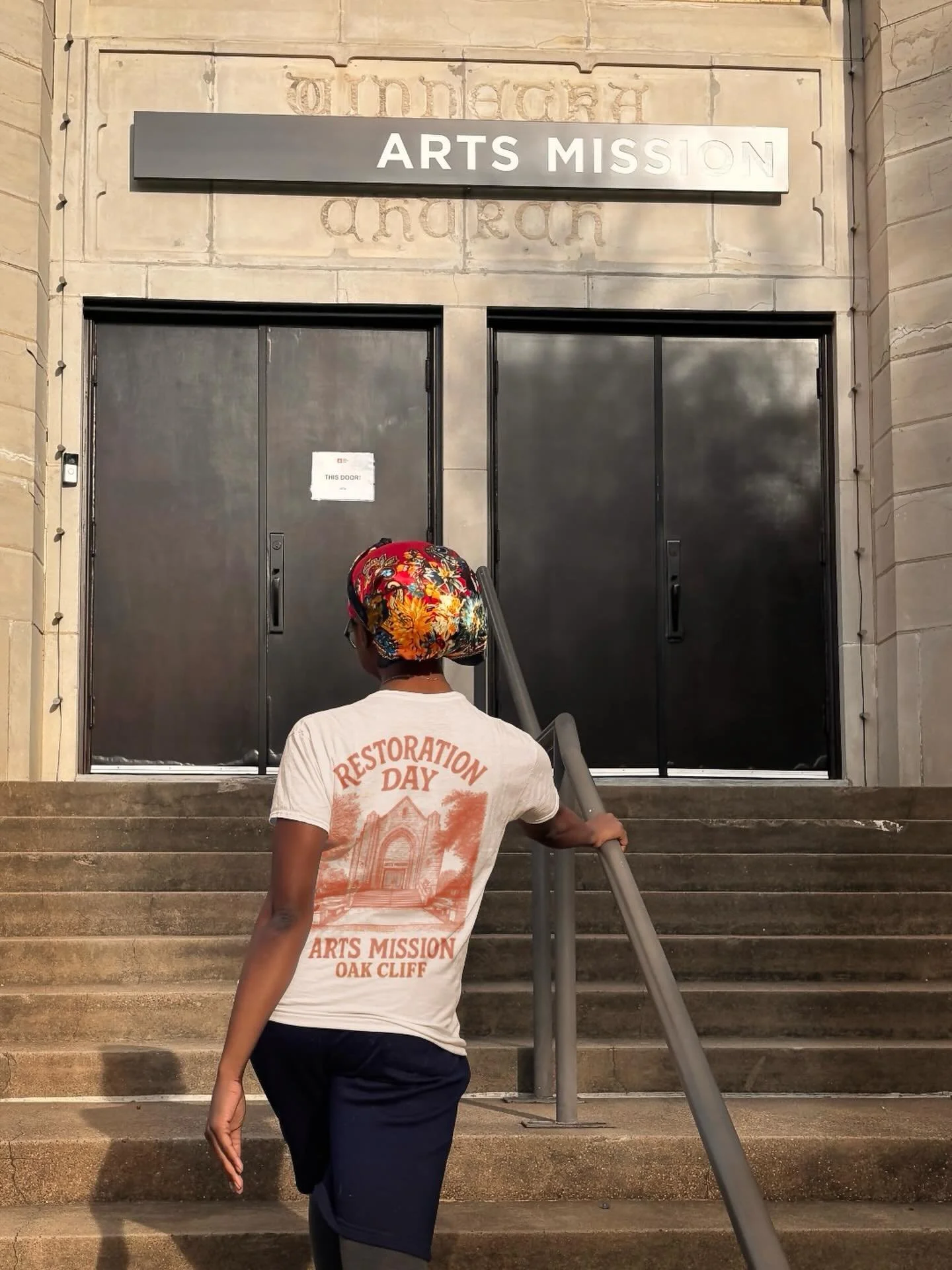 You asked, we answered. Restoration Day shirts are here!
Whether you&rsquo;re planning to wear yours while we paint and plant, or you&rsquo;re cheering us on from afar, each shirt directly supports the ongoing care of Arts Mission Oak Cliff, the buil