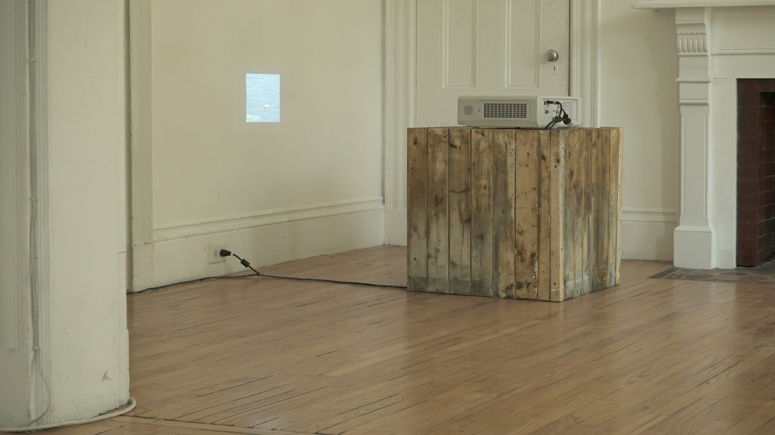  July 2019. Digitized 16mm film projection and wooden formwork pedestal. Kirkland Gallery, Cambridge, MA. 