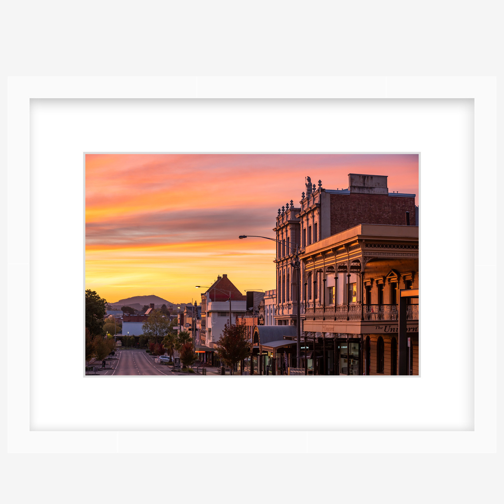 Dawn over Minerva - 12" x 8" white.png