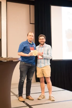 Pyles Camp Executive Director, Stripes (Left), receiving the award from ACA Southern California/Hawaii Local Council of Leaders Chair, Andy Kimmelman (right) at the 2018 ACA Spring Leadership Conference