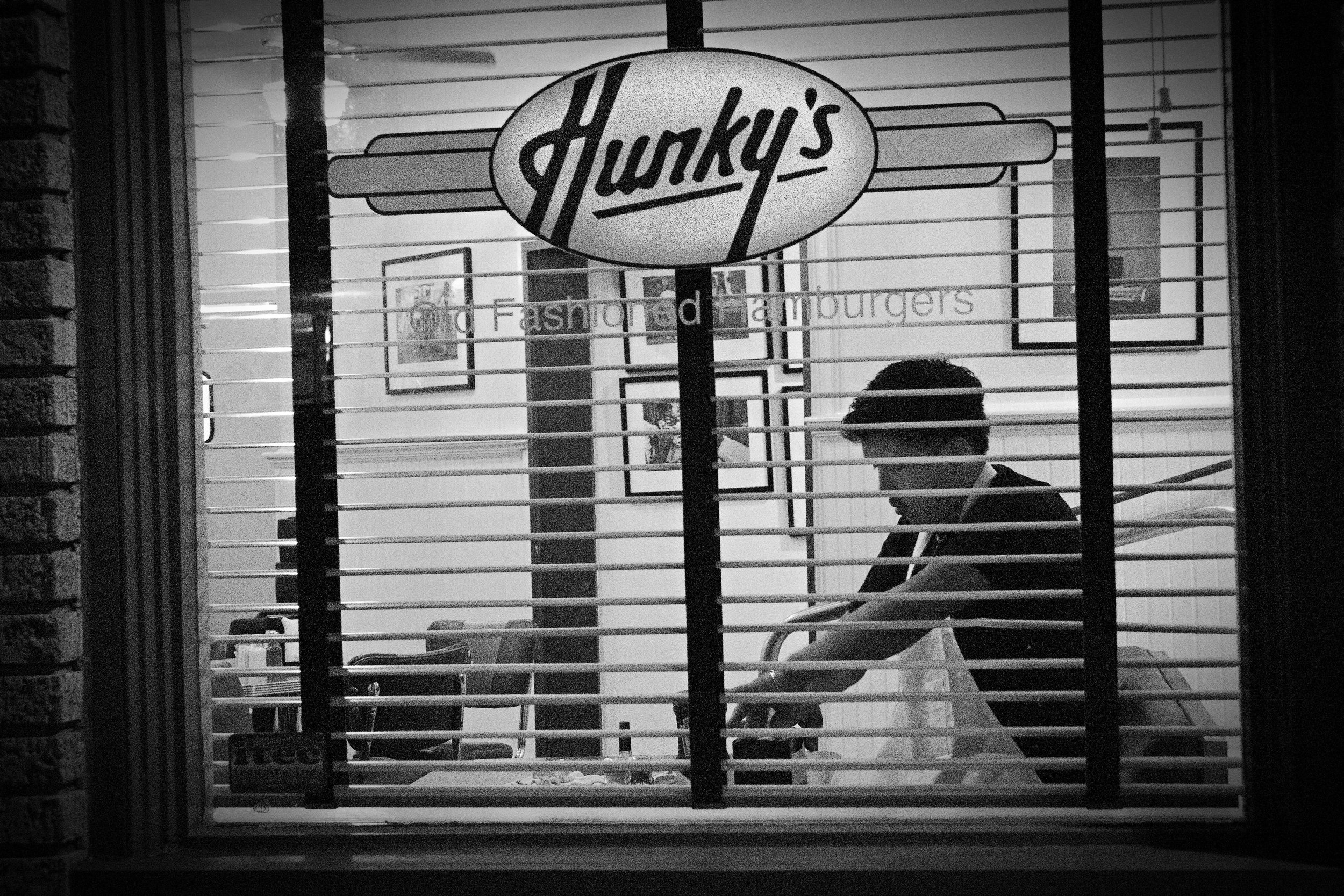 Husky's Burger Man in Window.jpg