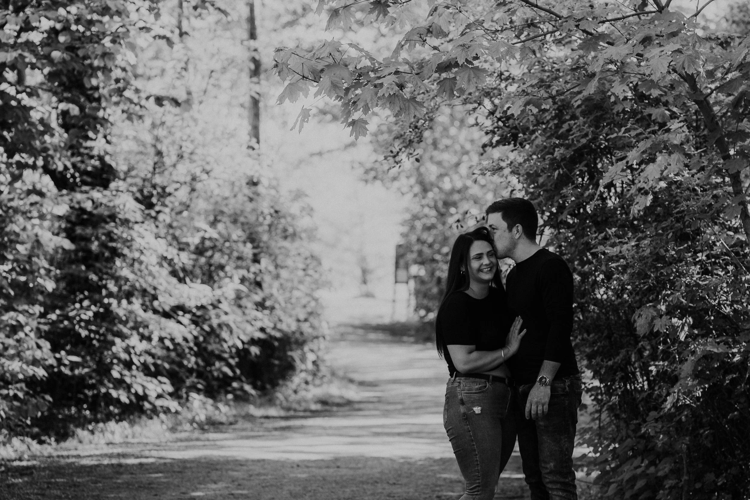 Couple kissing black and white Wokingham
