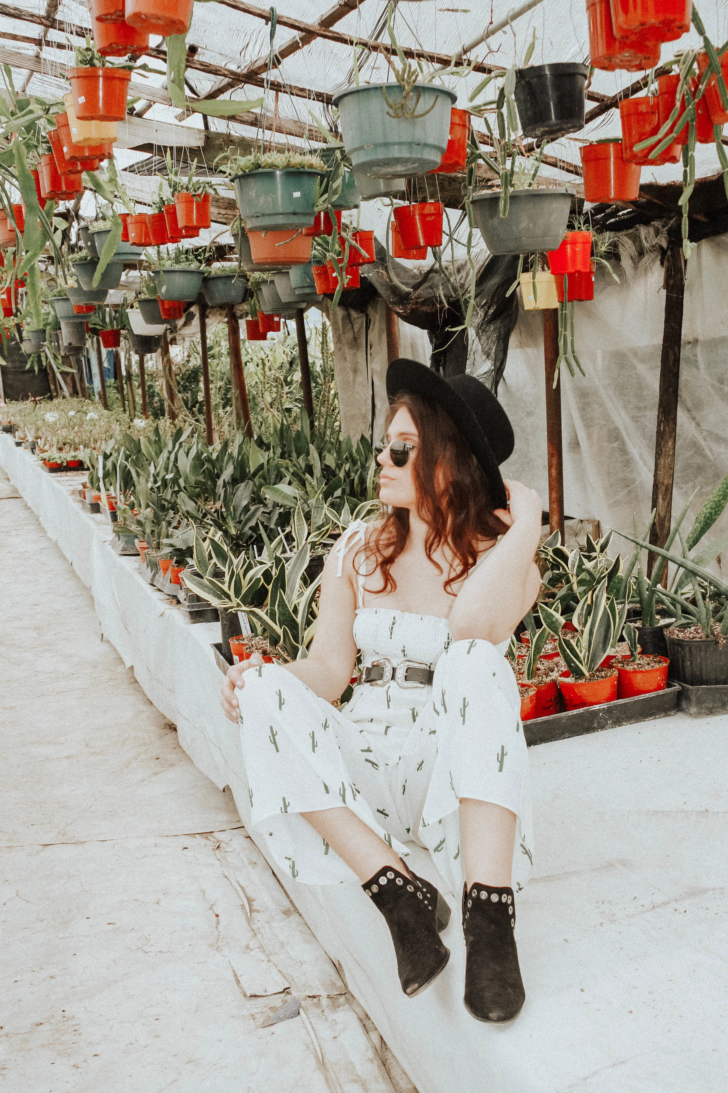 Hat: Lack of Colors; Sunglasses: Ray-Ban; Jumpsuit: Show Me Your Mumu; Belt: B-Low The Belt; Shoes: Sam Edelman