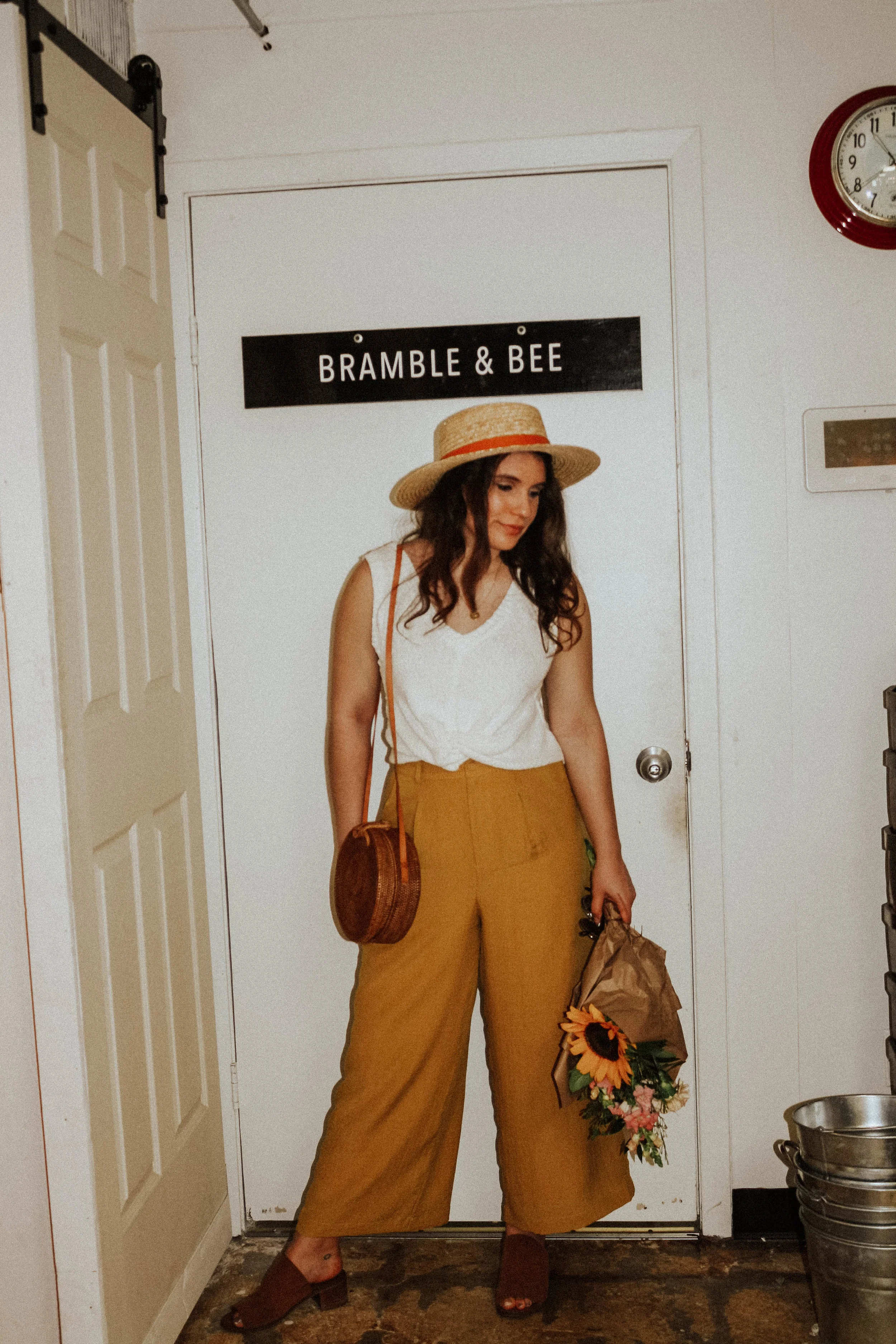 Hat: Lack of Colors; Top: Moon River; Pants: Lost + Wander; Shoes: Steve Madden; Purse: Cleobella