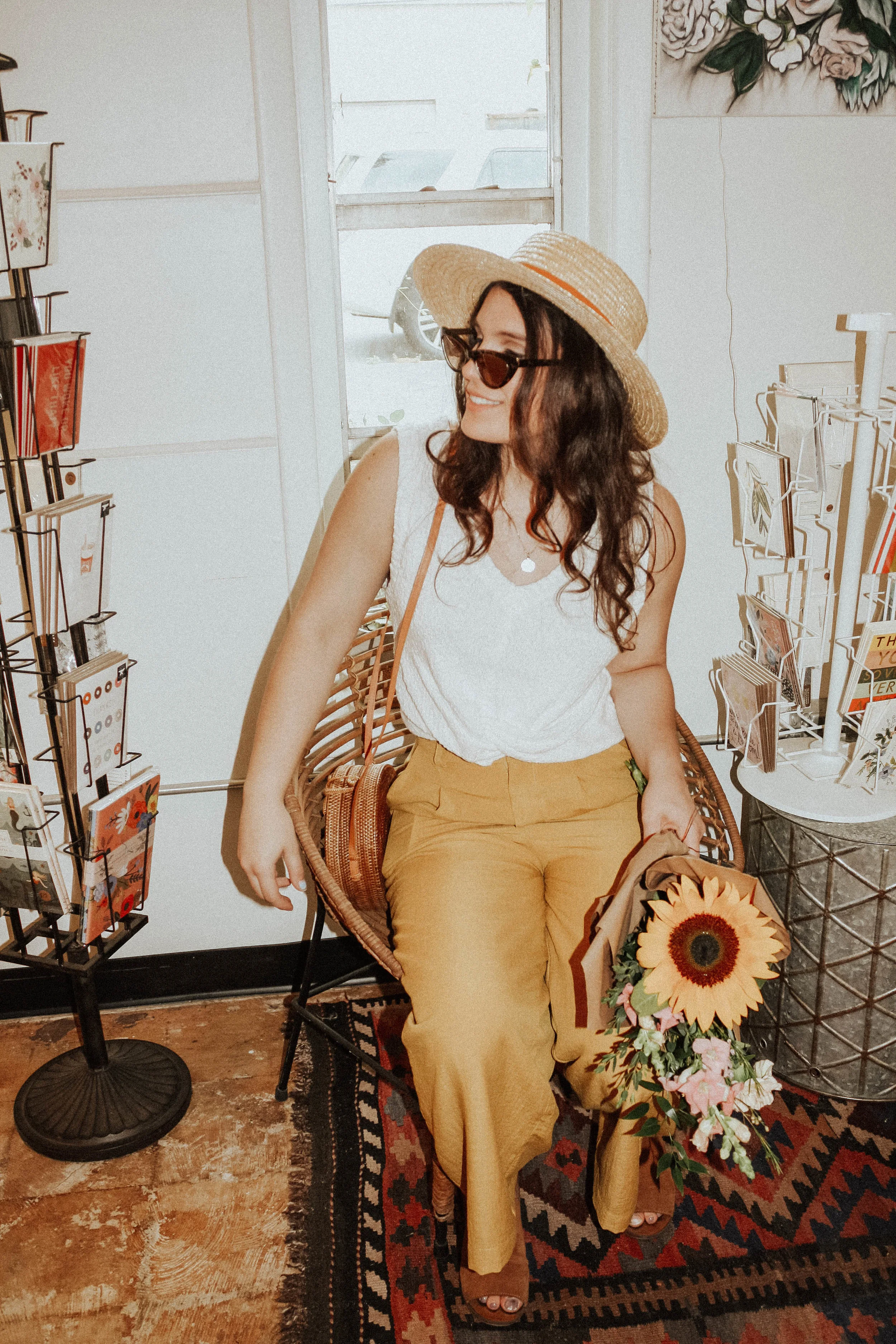 Hat: Lack of Colors; Sunglasses: Amuse Society X D'Blanc; Top: Moon River; Pants: Lost + Wander; Shoes: Steve Madden; Purse: Cleobella