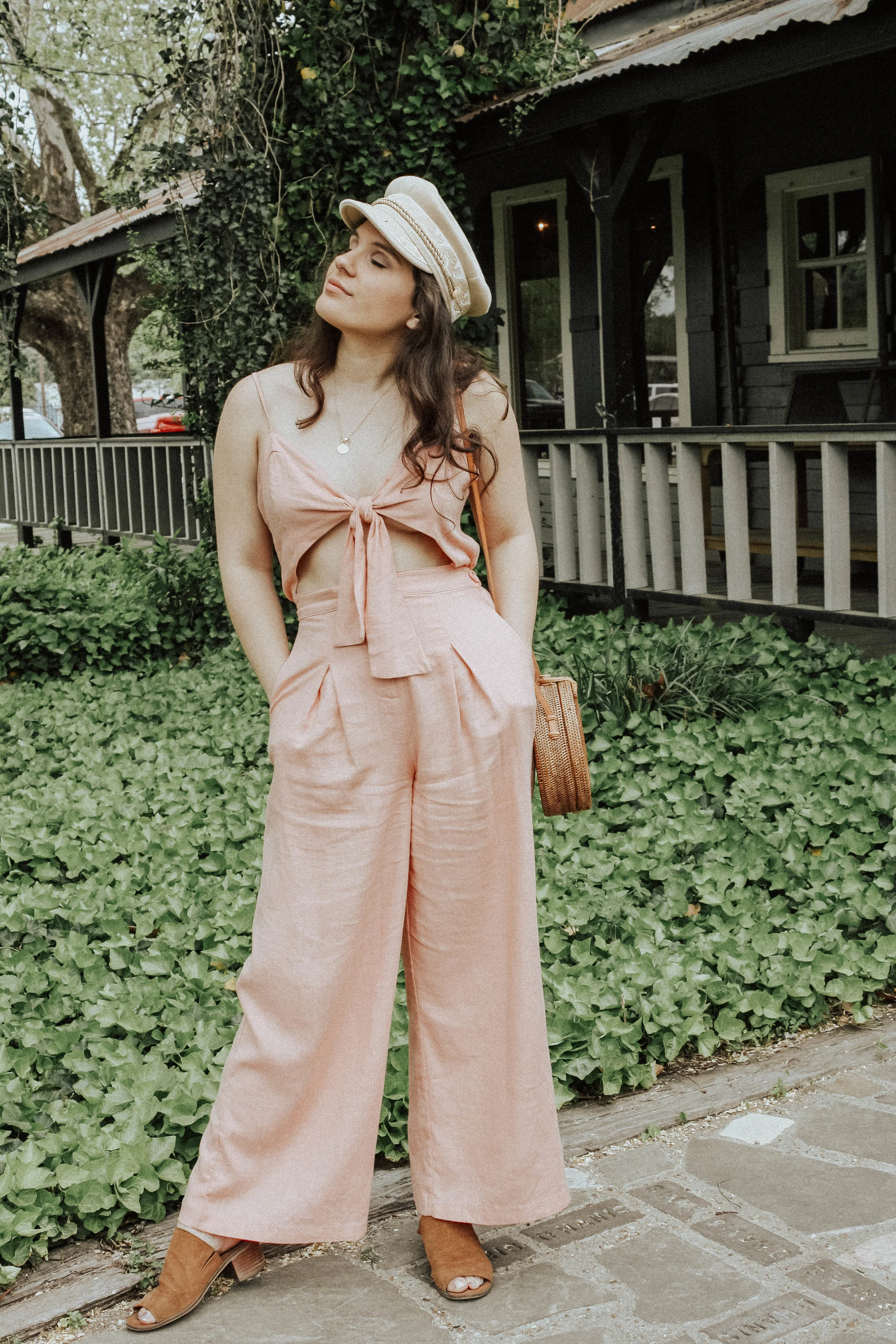 Jumpsuit: Moon River; Purse: Cleobella; Hat: Lack of Colors; Shoes: Steve Madden