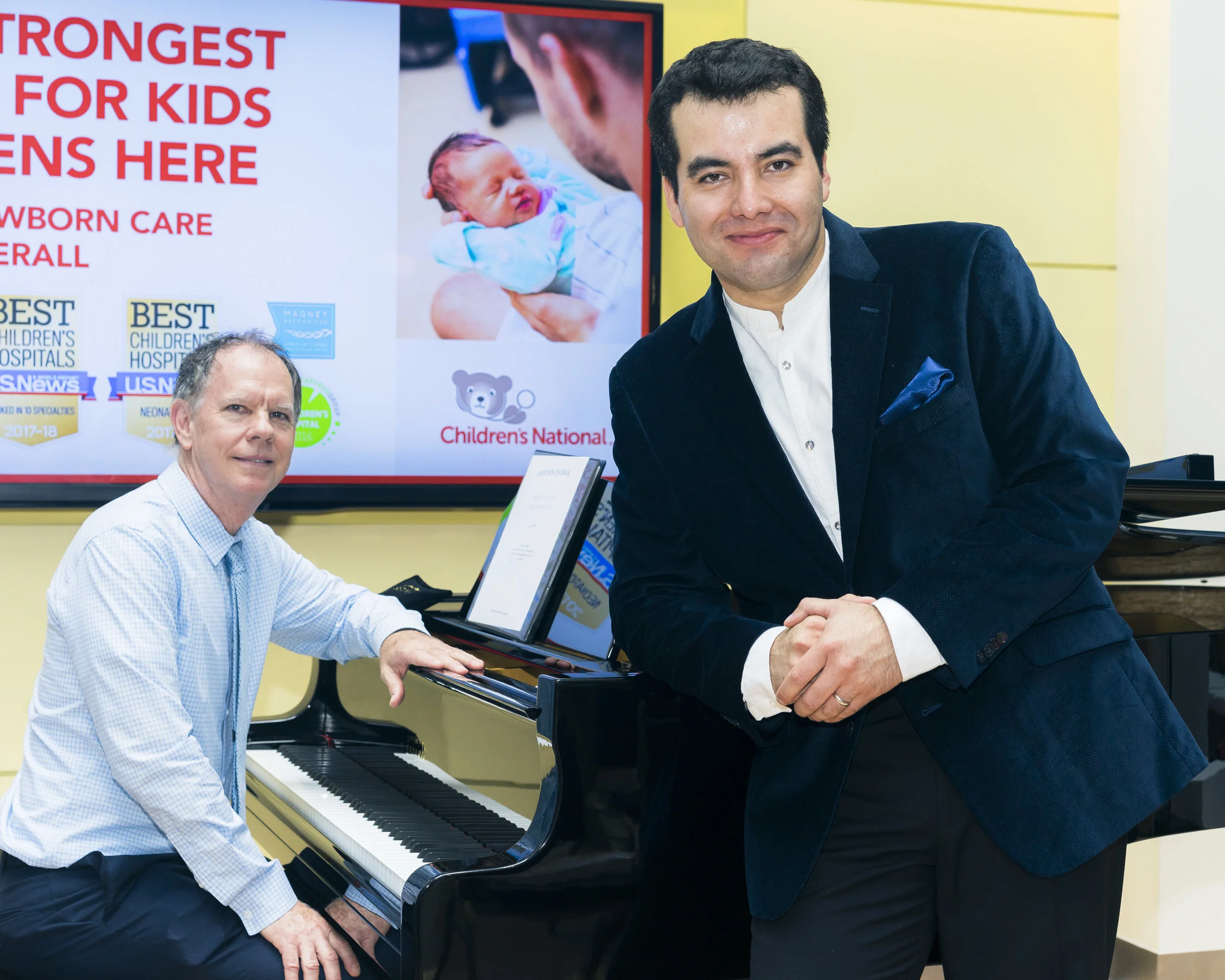 MDLO Founder Brad Clark and Baritone Javier Arrey at Children's National Medical Center.