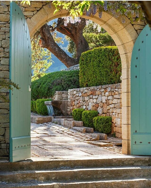 So many of my &quot;loves&quot; are wrapped up in this photo. The gate, the colour of the gate, the stonework, the greenery and most of all the longing to walk through and see what is beyond.

I have just come across an account via an inspiring lands
