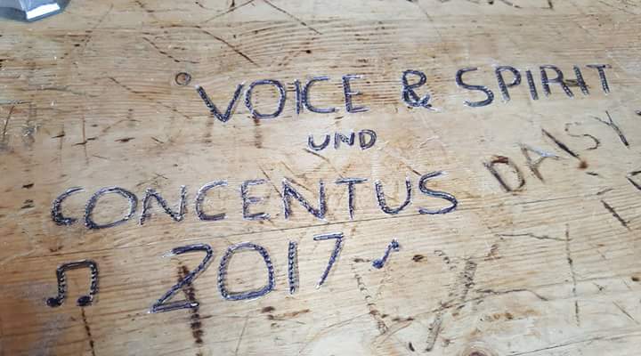 Carved into a pub table..