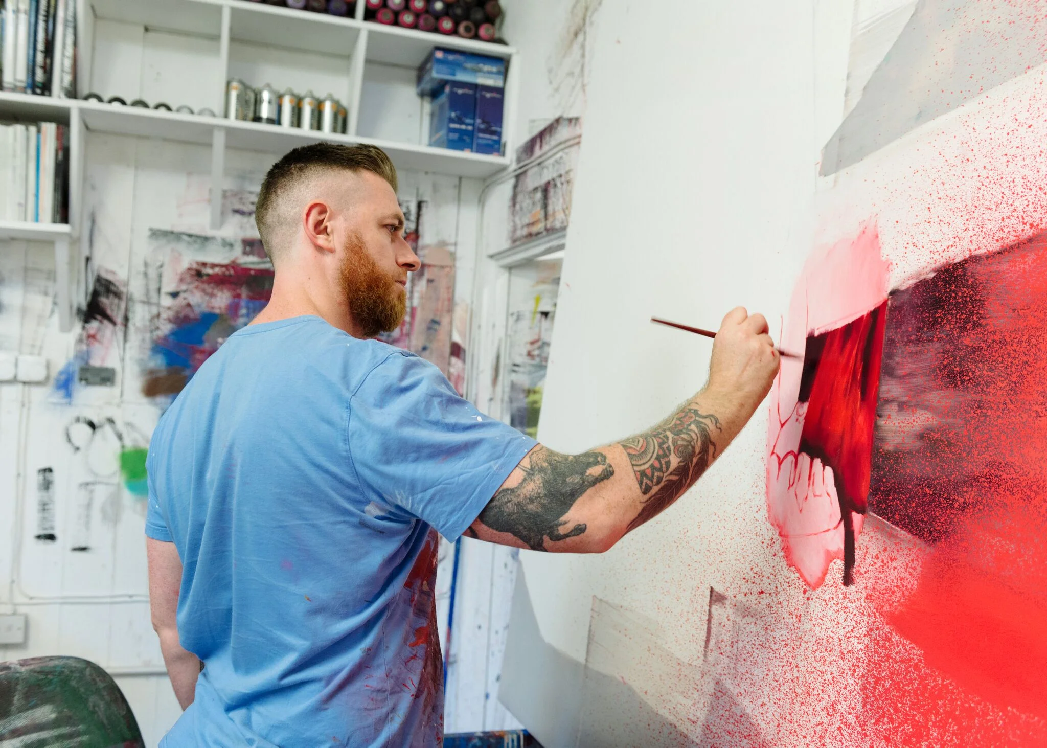 Above: Street Artist Conor Harrington at Work in studio | Cover image: D*Face, Console the Lonely, credit - © Lionel Belluteau