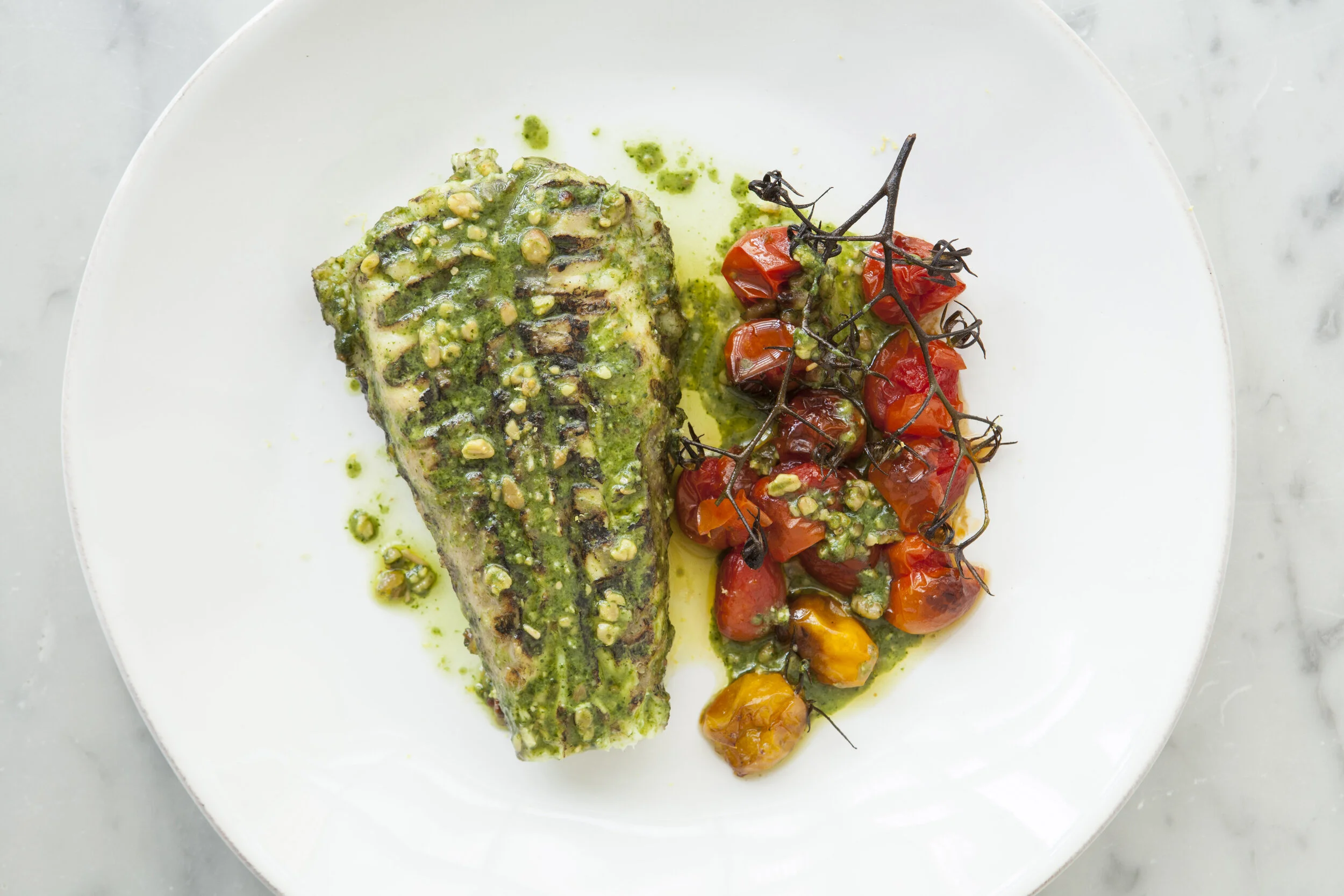 Chargrilled Monkfish Dressed in Pesto with Roasted Vine Tomatoes by Andrew Hayes-Watkins