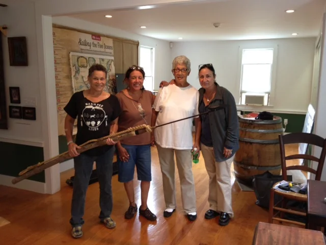 mashpee-wampanoag-museum-ramona-kitty-bernadine-leslie-with-harpoon.jpg