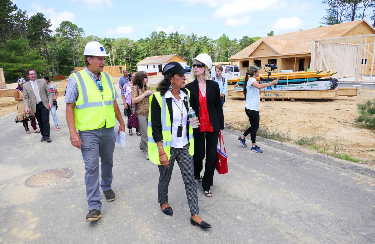 From Left: David Greene, tribal representative with RGB Architects; Tribal Housing Director Michelle Tobey; and General Assistant Secretary for Public and Indian Housing Dominique Blom tour First Light Wampanoag Homes.