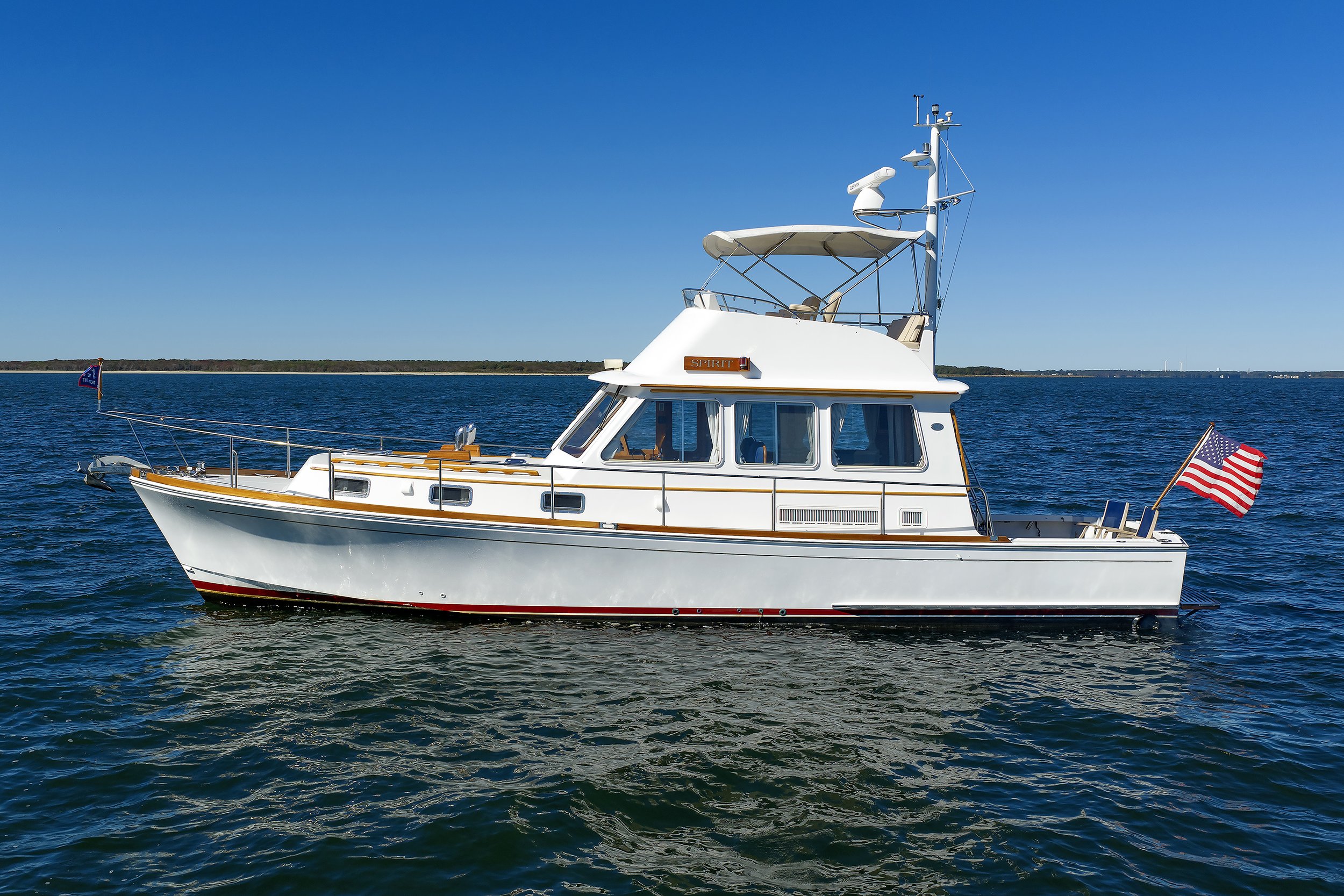 white boat in water