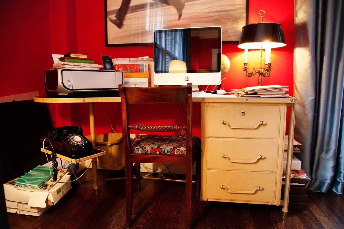 That phone!! I love this because it’s a real working desk. Not a desk for show. There are several chairs with needlepoint cushions in various photos. Photo by the Selby
