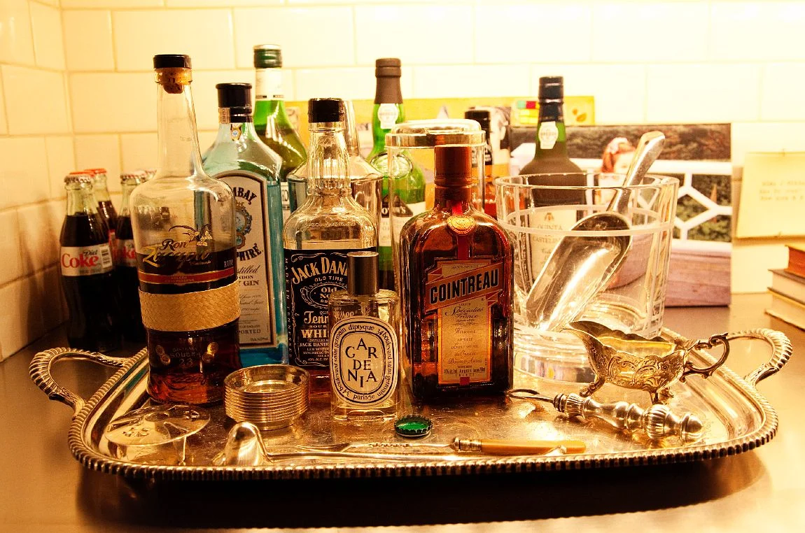 LOVE this. Why do I so love the combination of silver and liquor bottles? I just love the way it looks so much! Phot by The Selby