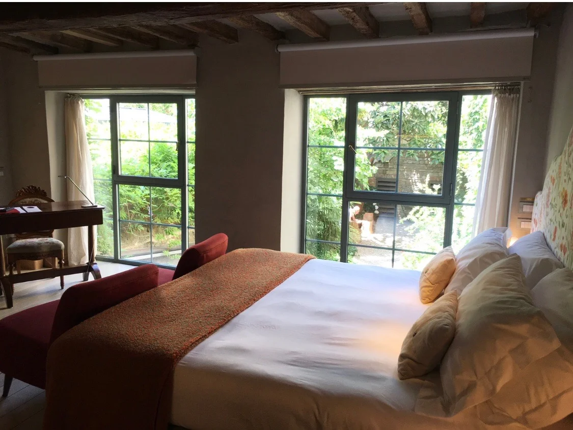 Our romantic hotel room in Florence overlooking a hidden garden