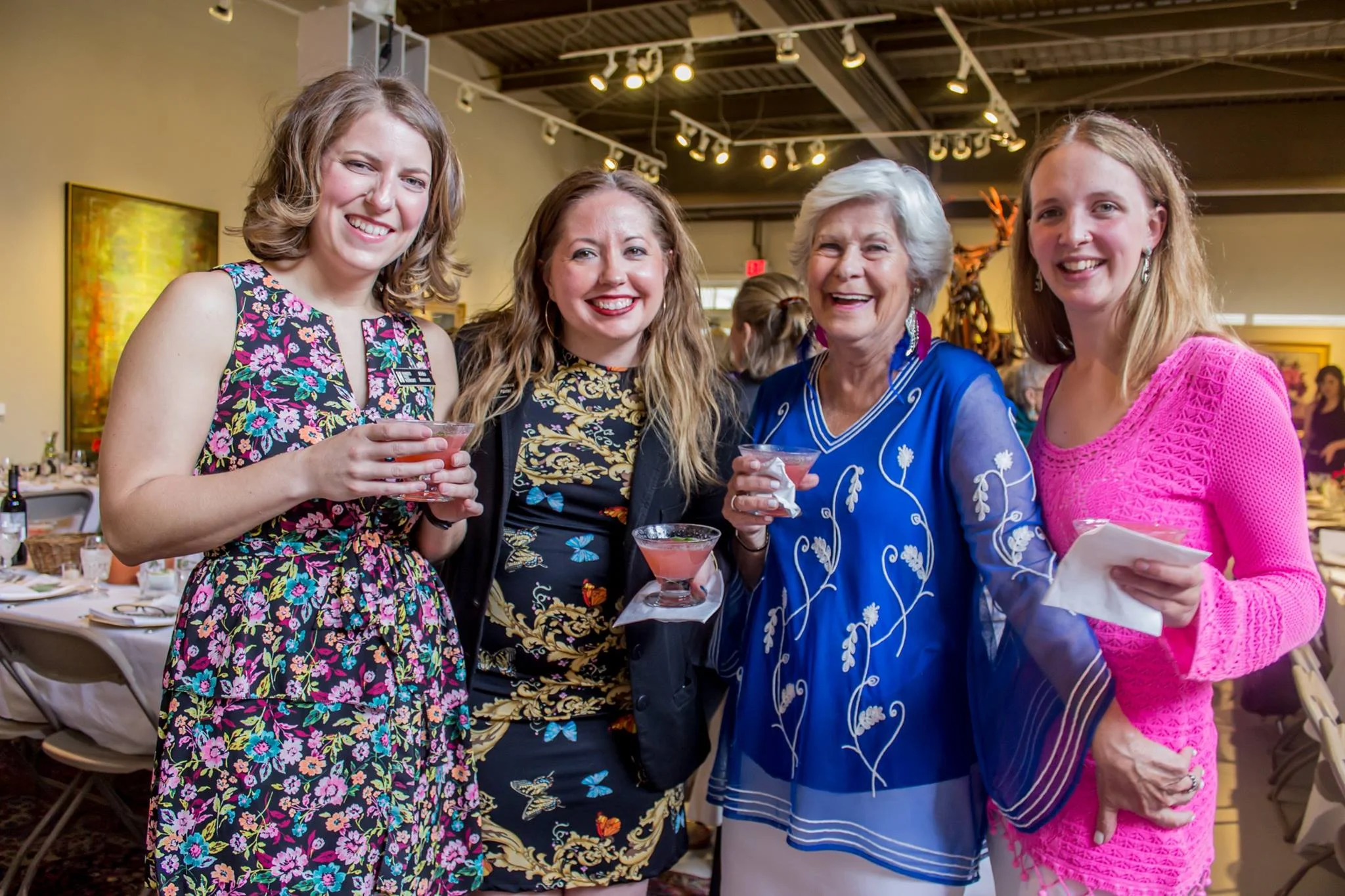 On the right, Lisa’s mother Mona and daughter in law Kimberly welcome friends.