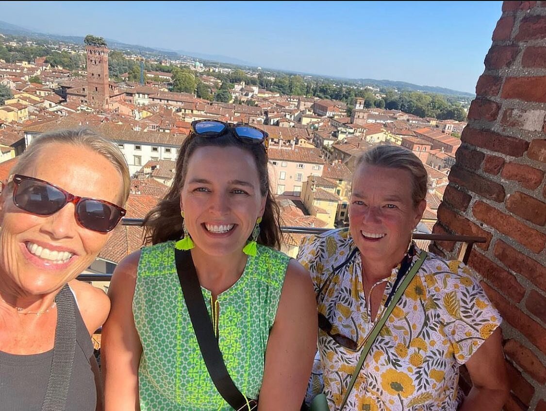 Kate, Katrina, and Meg at the top of the Lucca tower. Who is going up in 2024? 🥇