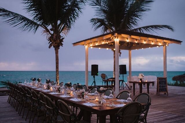 Beautiful outdoor dinner reception at La Bougainvillea on Eleuthera! Ocean View✔️Twinkly lights✔️ Palm trees✔️ // #outdoorrecpetion #beachwedding #eleutherawedding