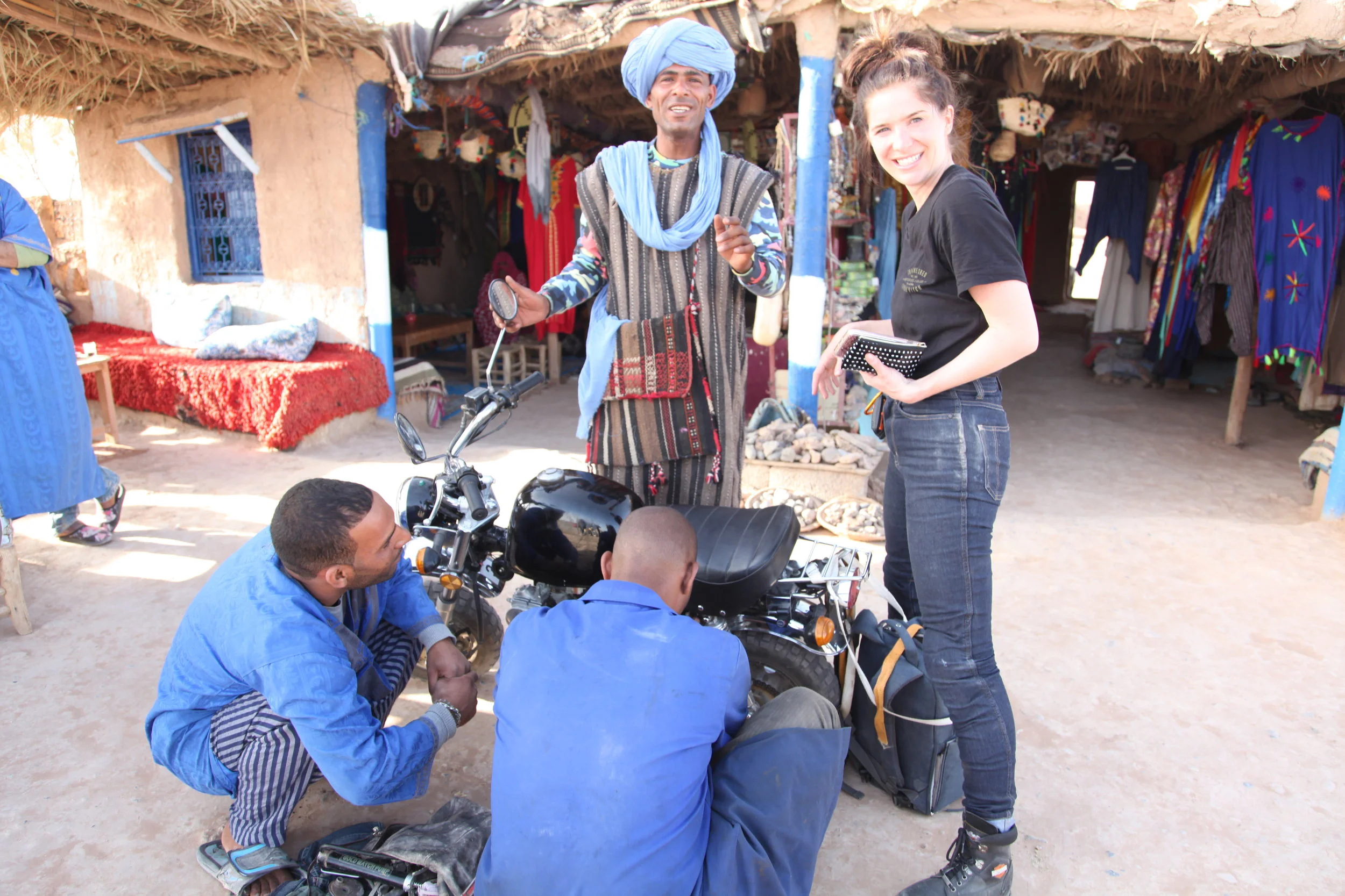 Mo getting her bike fixed.jpeg