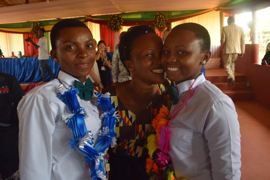Form 4 Graduates with Relatives -- Jacqueline and Amina.jpg