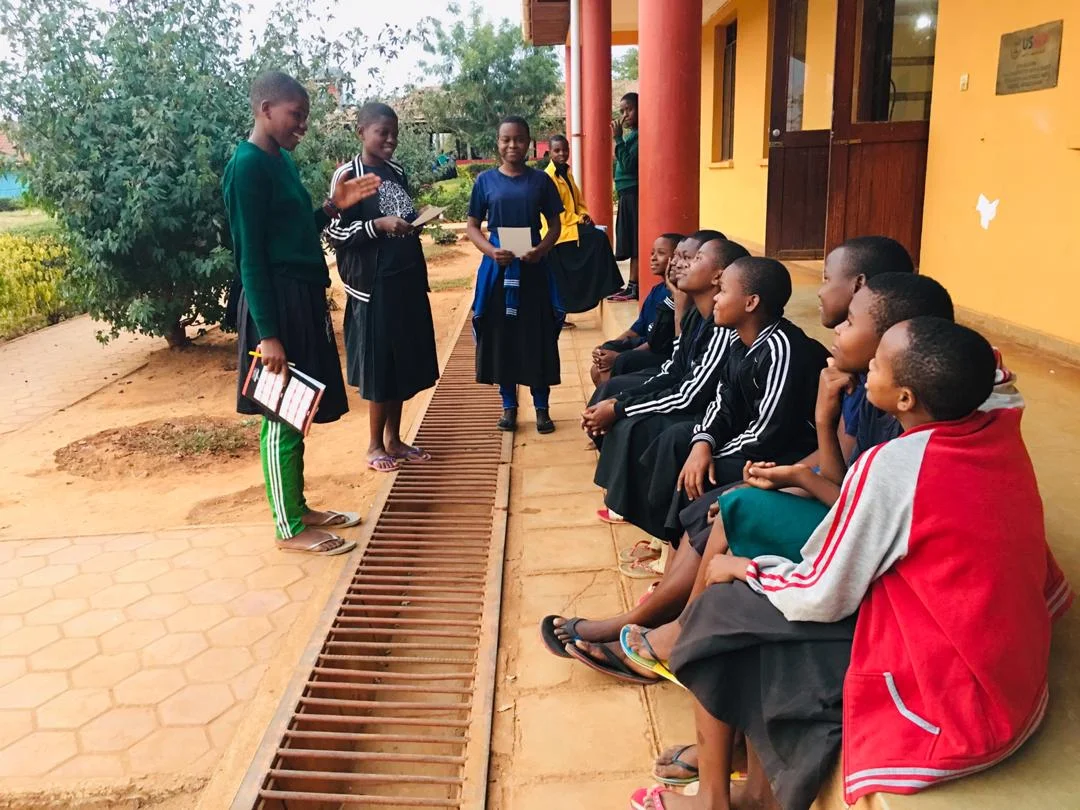 Girls in The Program meeting during their lunch break.