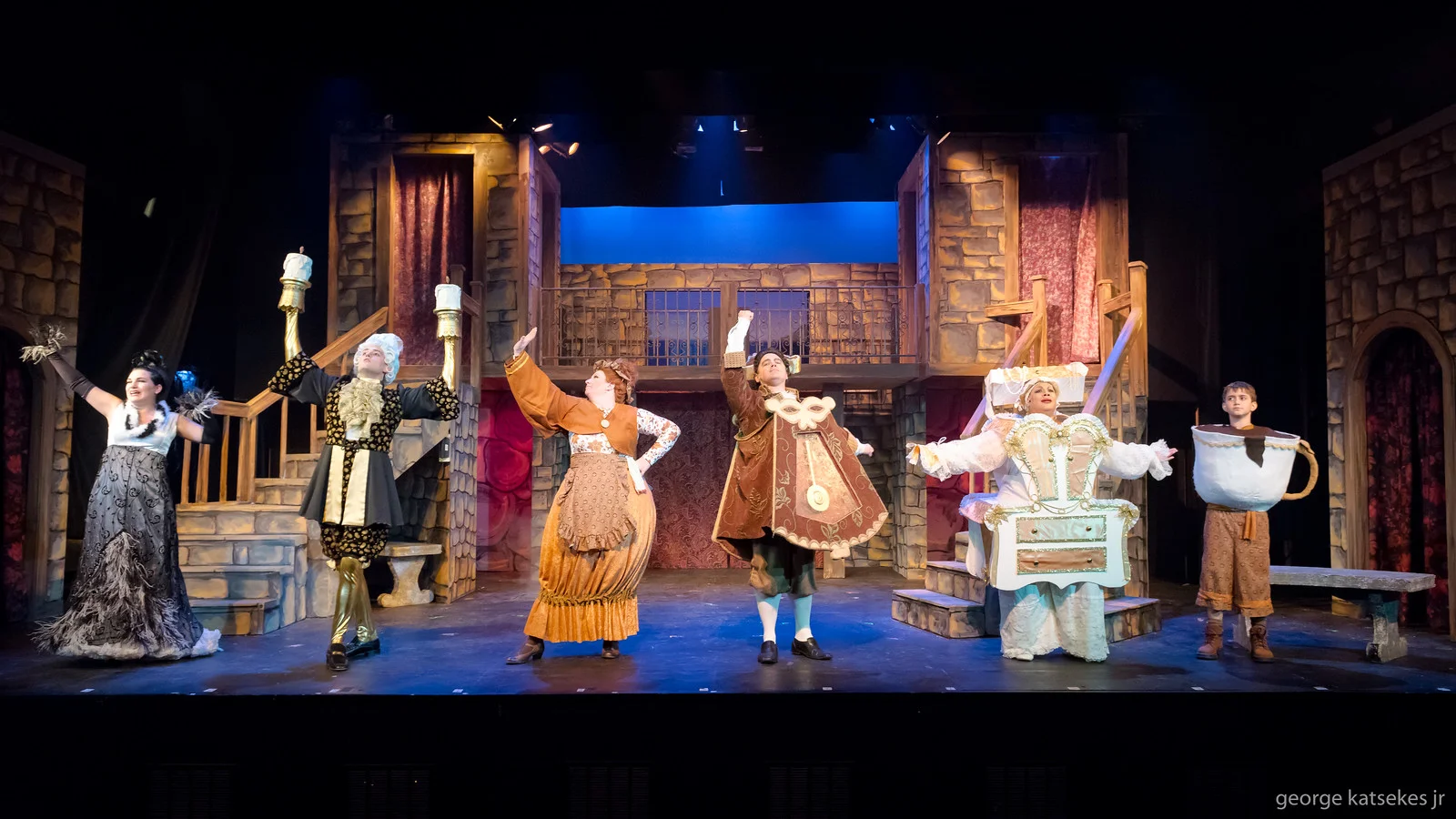 Babette (Lydia Rose Eiche), Lumiere (Eric Welch), Mrs. Potts (Marcee Doherty-Elst), Cogsworth (Corey Richards), Madame De La Grand Bouche (Sharon Tyler) and Chip (John Batory) sing about how life will be when they shed their objects and become people during the "Human Again" song in a scene from Sunset Playhouse's "Beauty and the Beast."